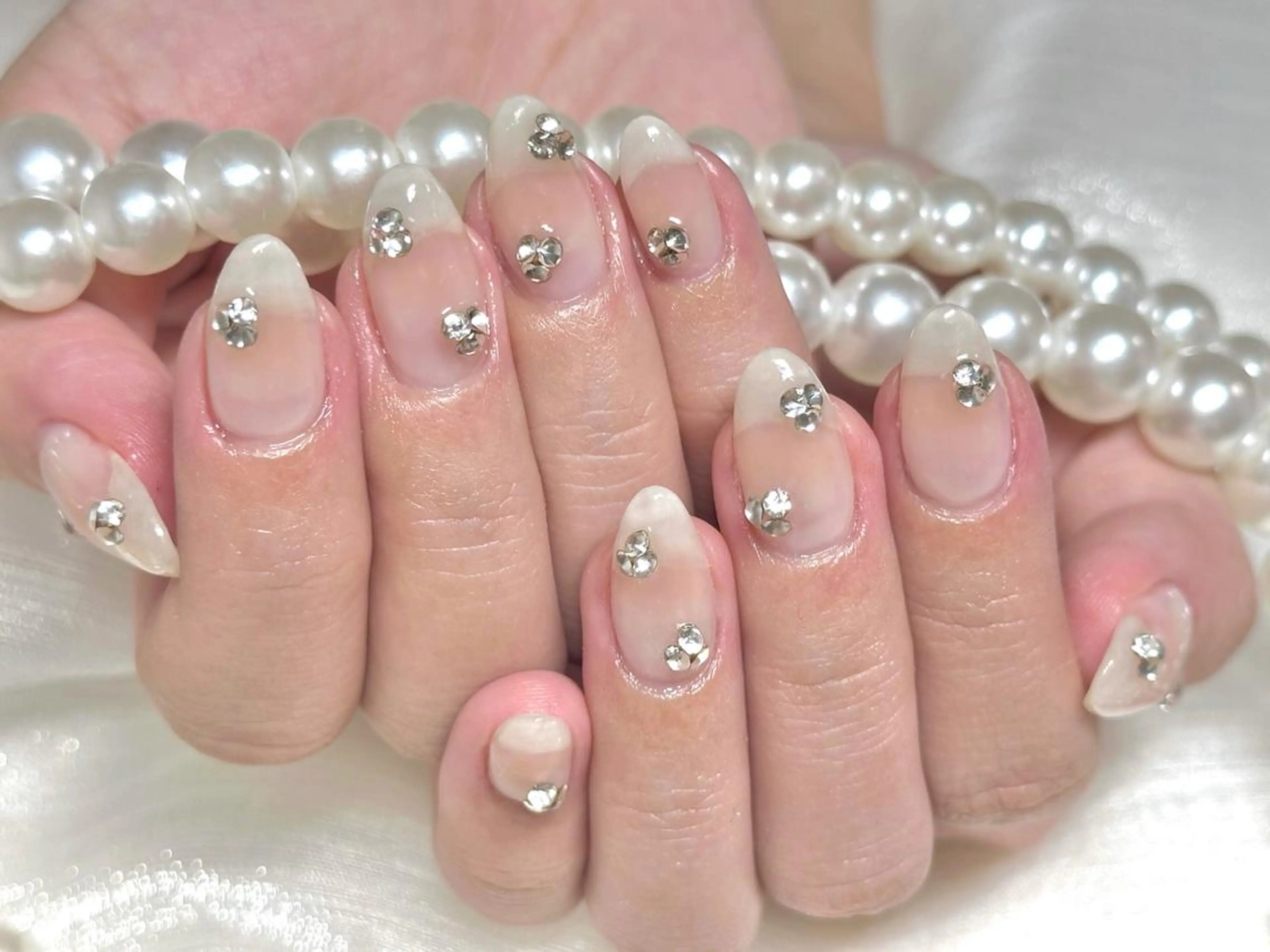 ネイル オーロラネイル 長さ出し フレンチネイル ガーリー キラキラネイル Lucky nail salonのネイルデザイン