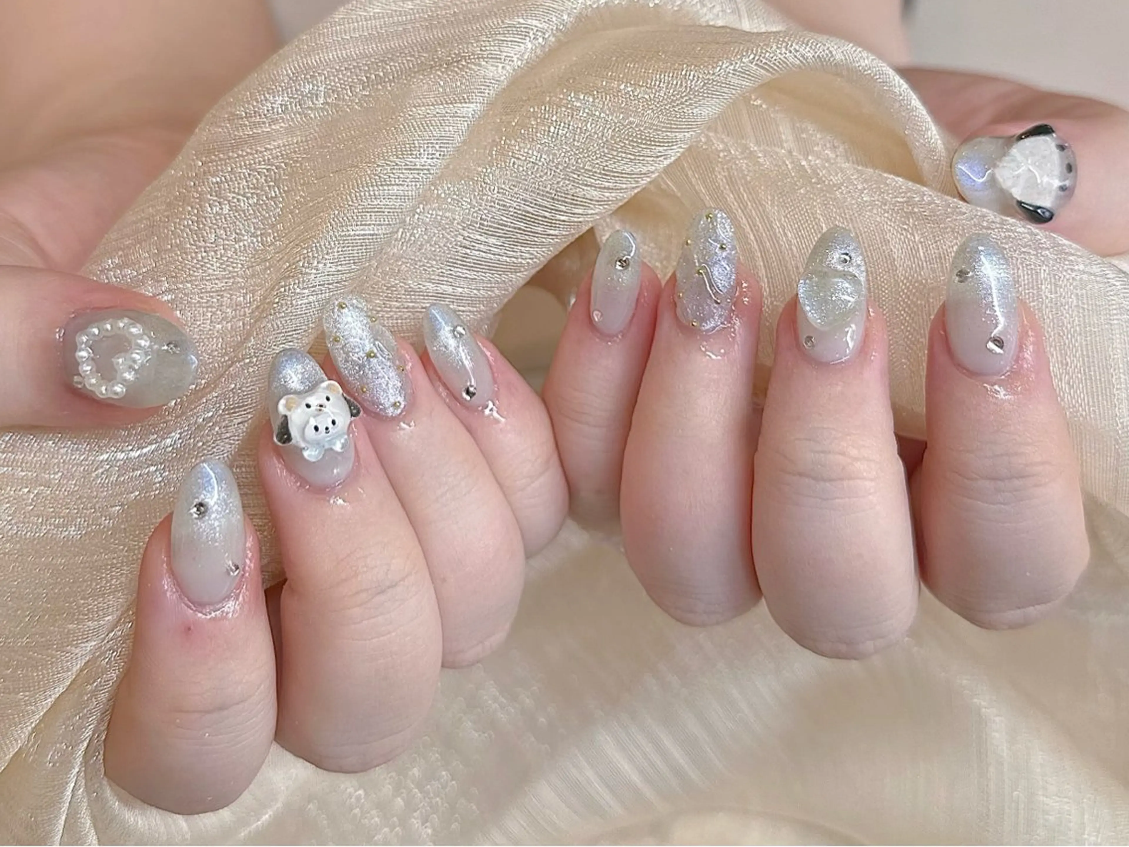 ネイル アートネイル 韓国ネイル 水色 ロングネイル マグネットネイル ハンドネイル ハンドケア NailDemure 【銀座店】のネイルデザイン