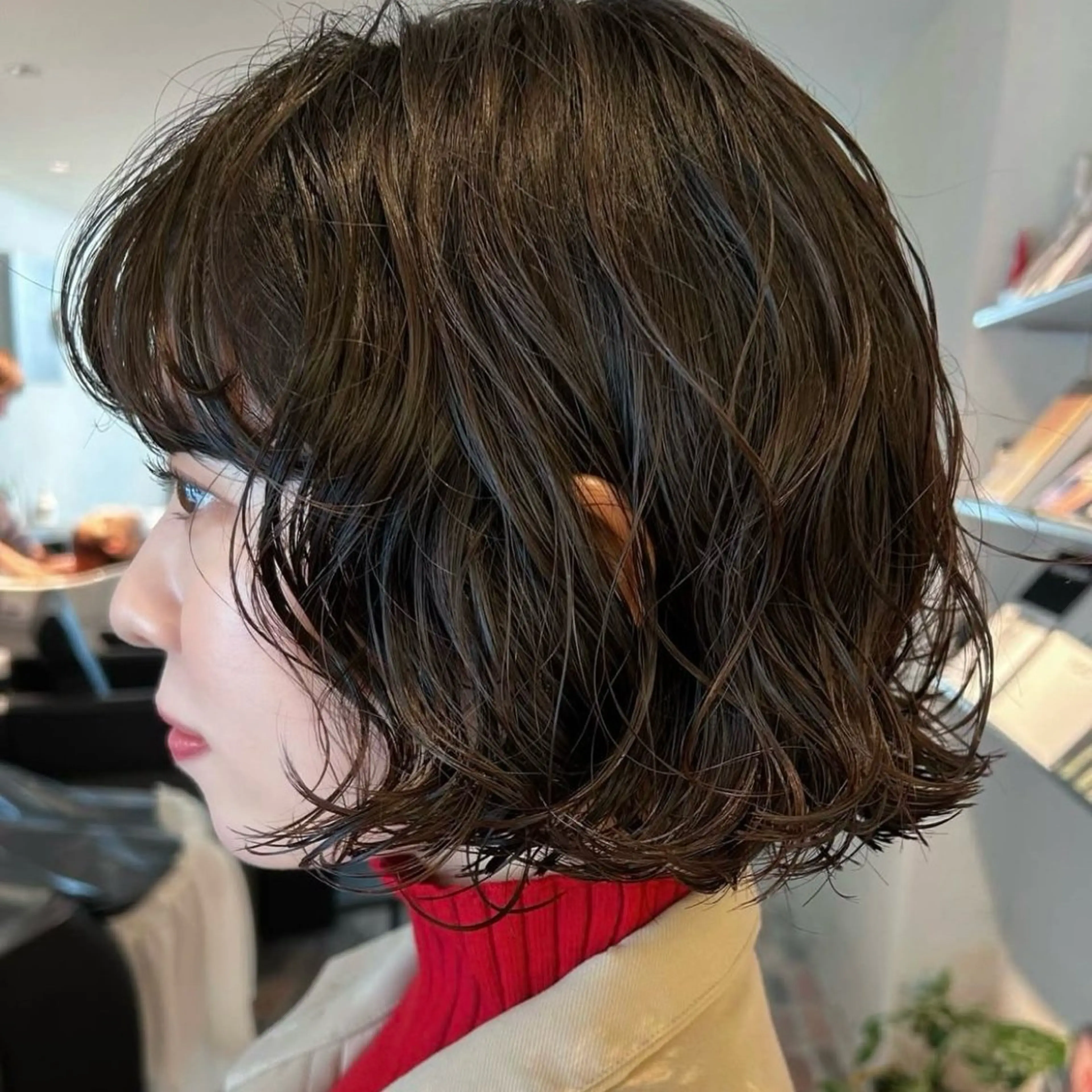 パーマ AILERON 陣岸のヘアスタイル