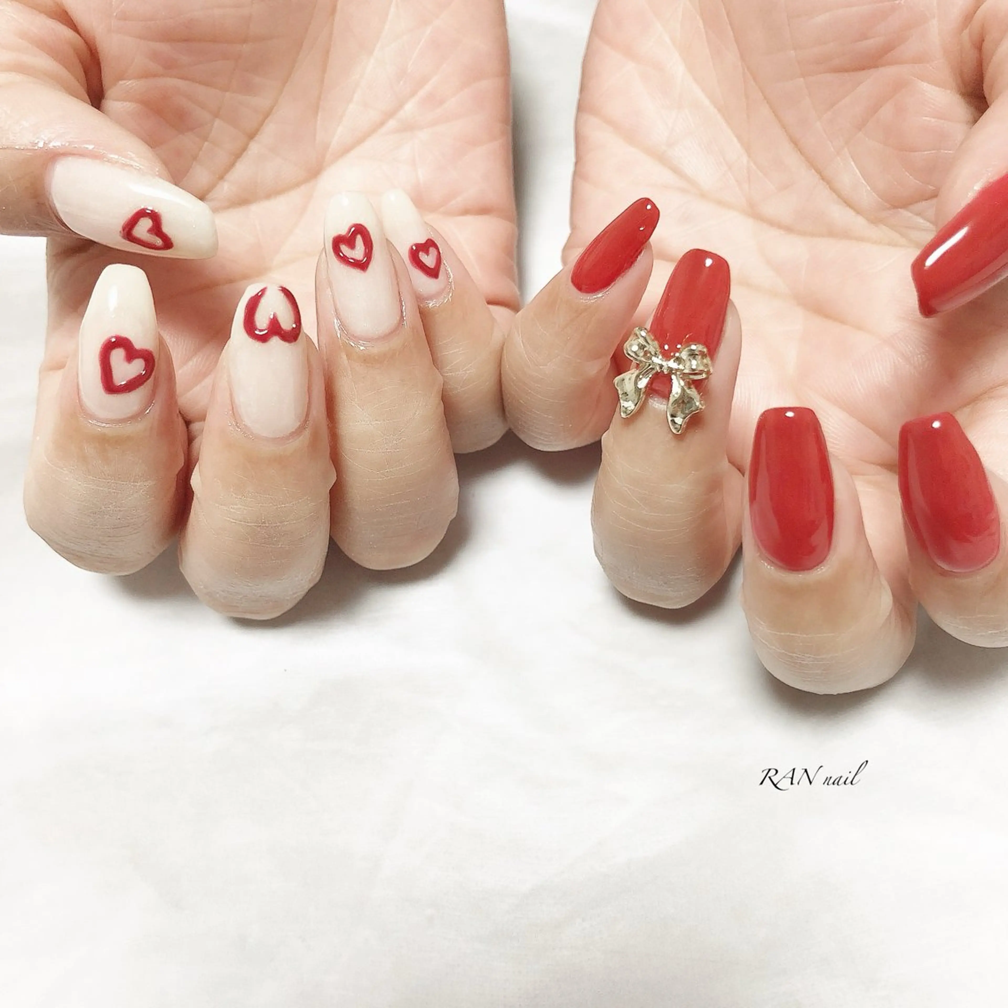 ネイル アニマル柄 ハート ラメ(グリッター) 赤色 リボン RAN nailのネイルデザイン