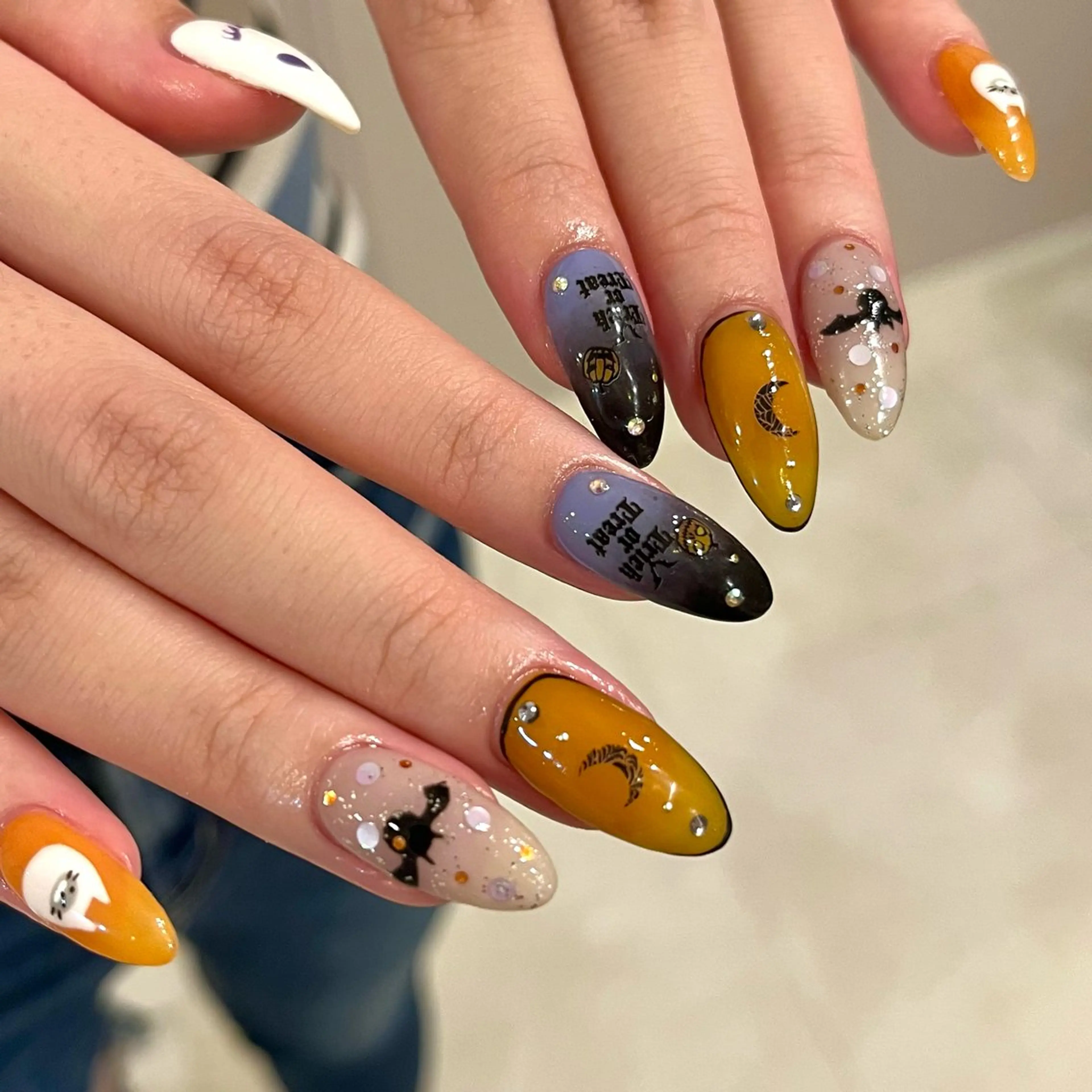 ネイル アートネイル ハロウィン キラキラネイル オレンジ ストーンネイル ハンドネイル Para Sol nail　Maoのネイルデザイン