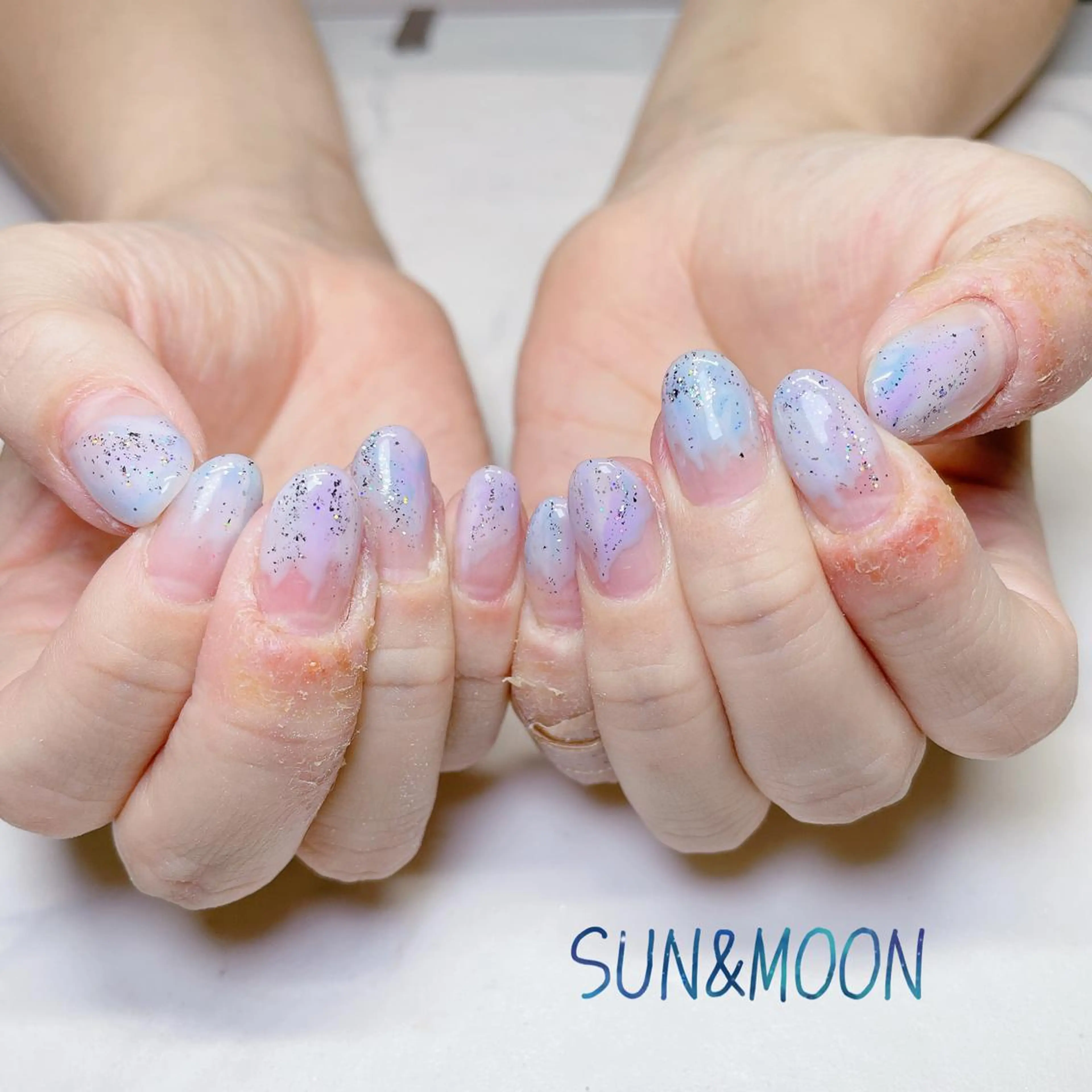 ネイル SUN&MOON REOのネイルデザイン
