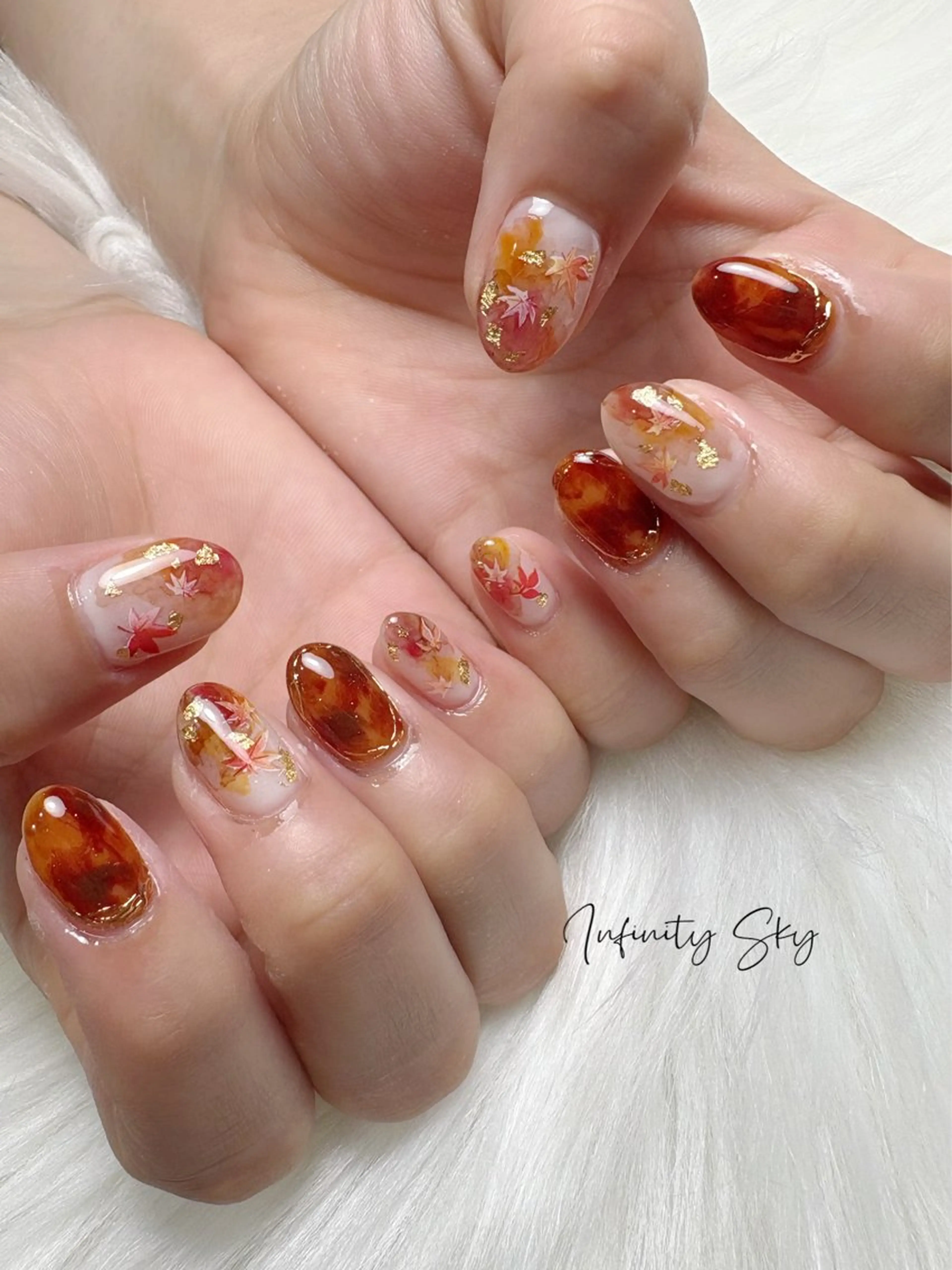 ネイル べっ甲ネイル ブラウン infinity skyのネイルデザイン