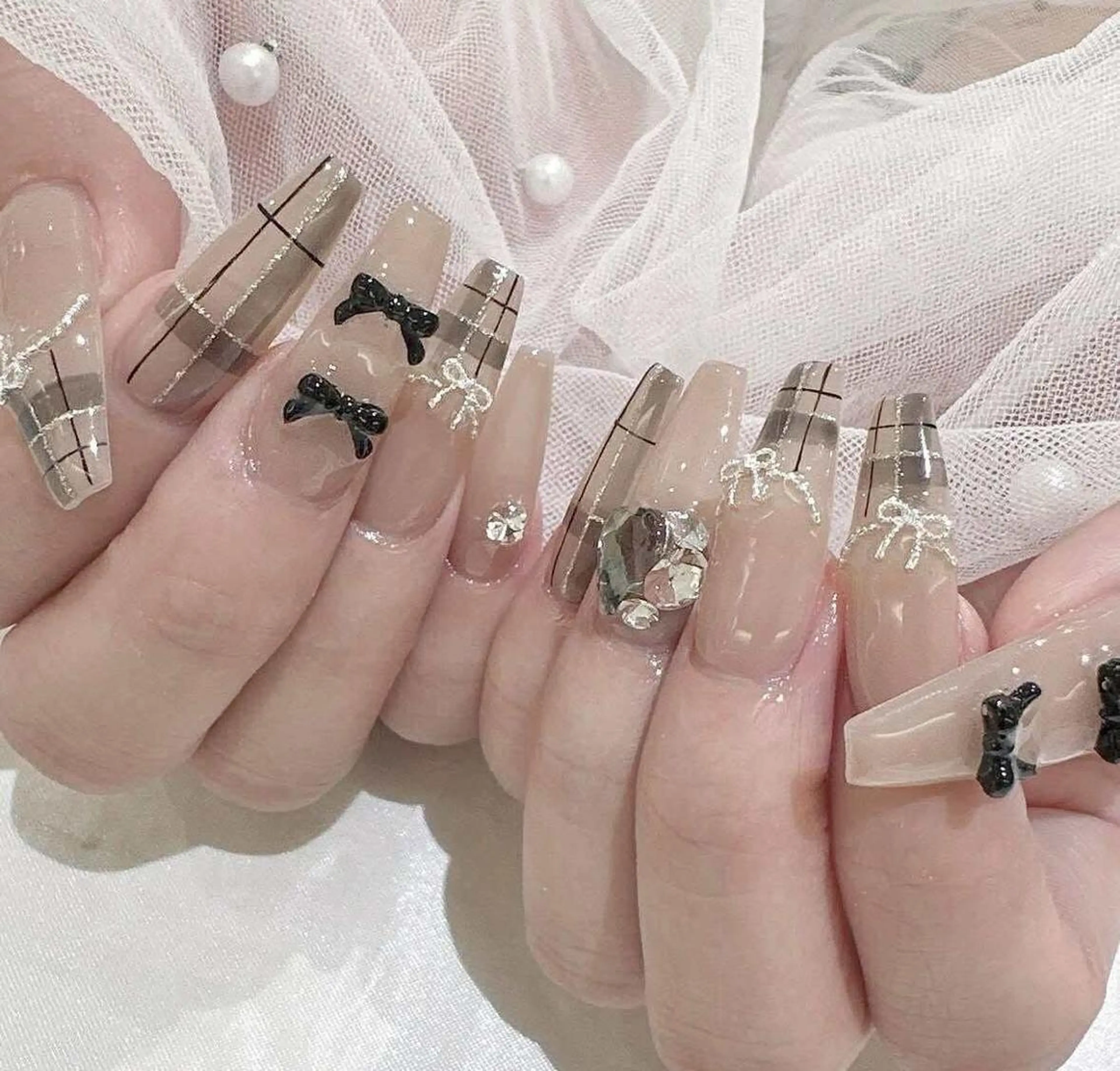 ロング 韓国風ヘア ハンドネイル Bling Salonのネイルデザイン
