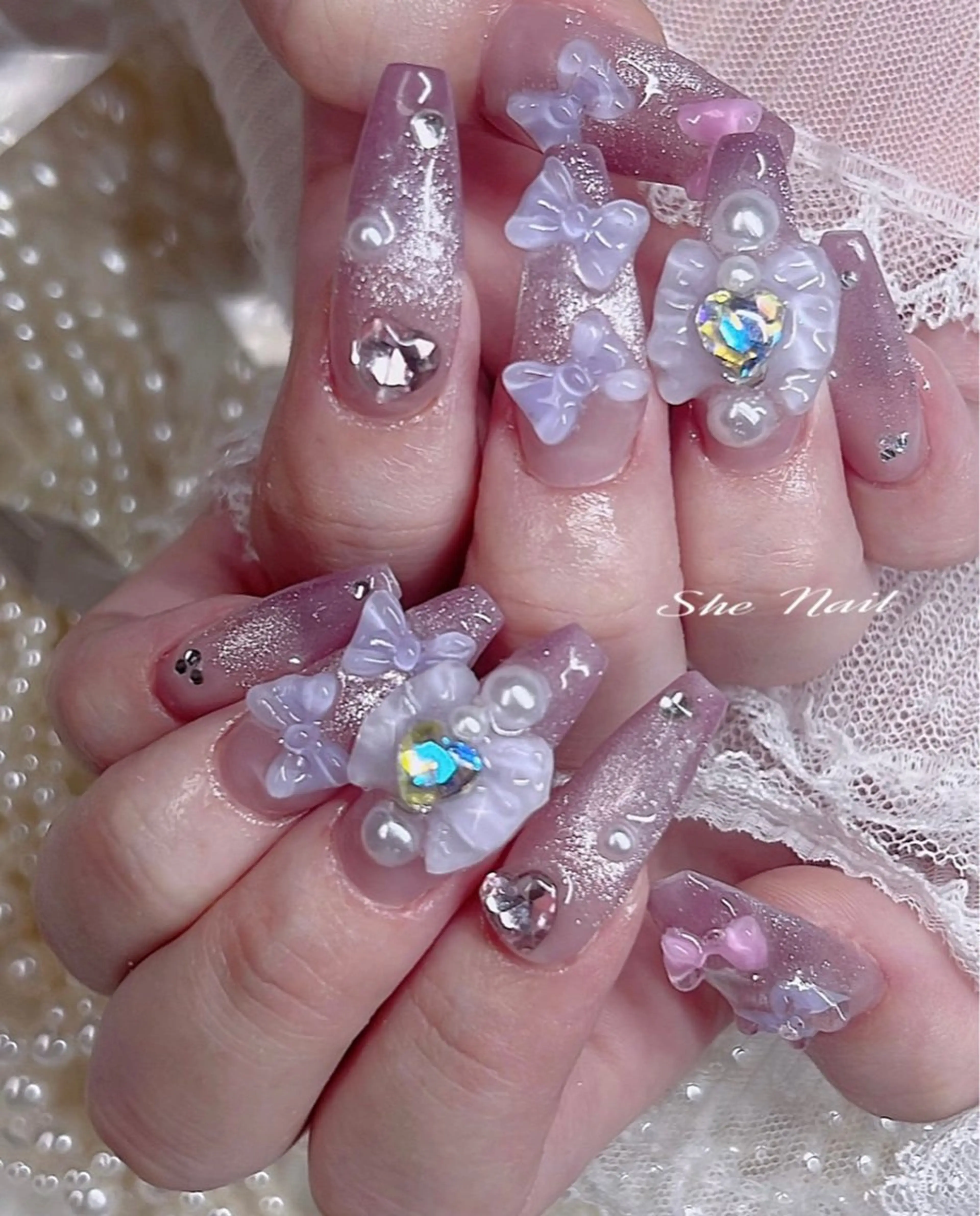 ネイル チークネイル 長さ出し フレンチネイル キラキラネイル マグネットネイル ISA_ BELLAのネイルデザイン