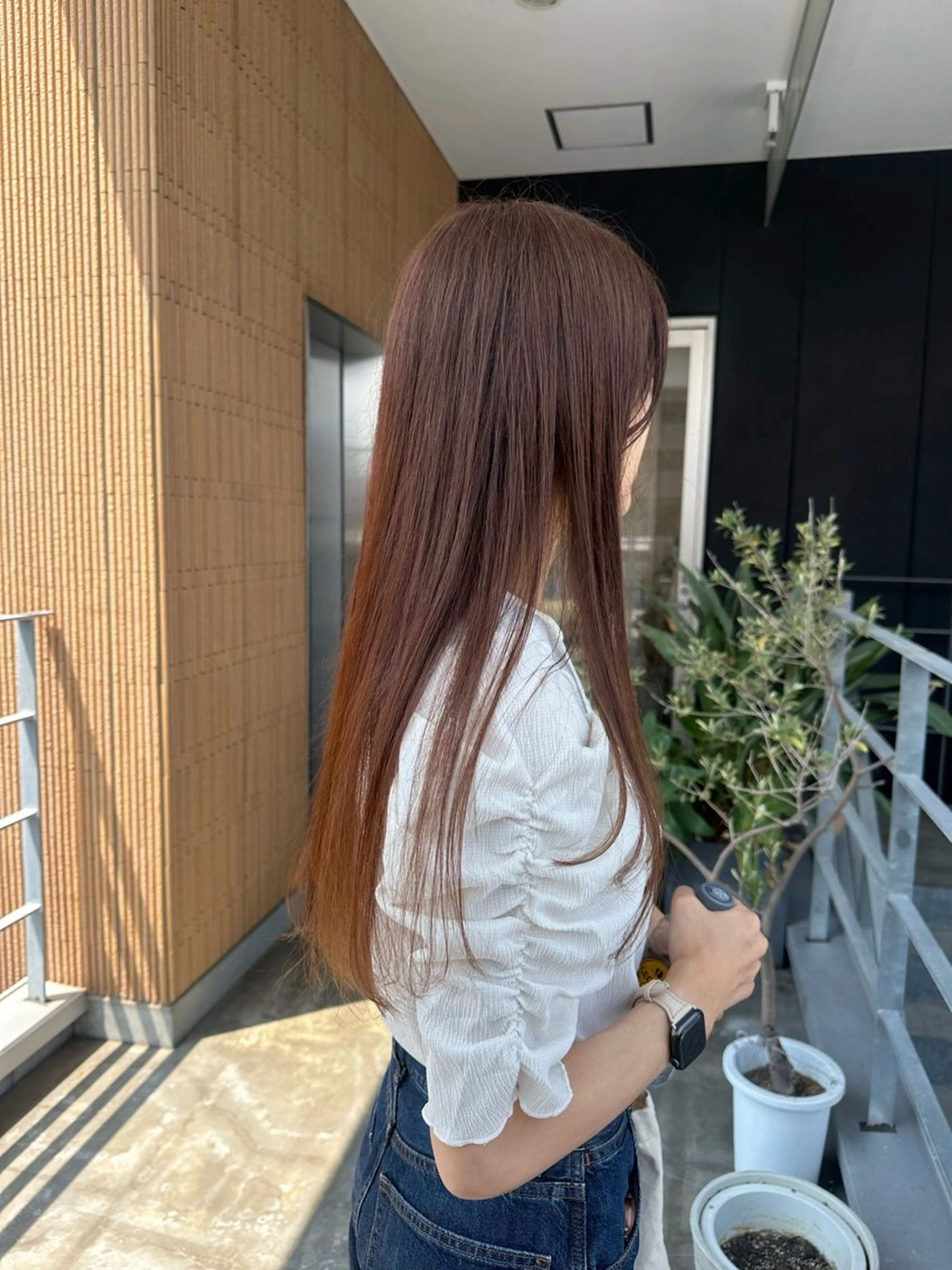 ロング カラー ヘアアレンジ ベージュカラー オレンジ オレンジベージュ カット ヘアカラー トリートメント soöze所属・sena/博多/ コテ巻き風パーマのヘアスタイル