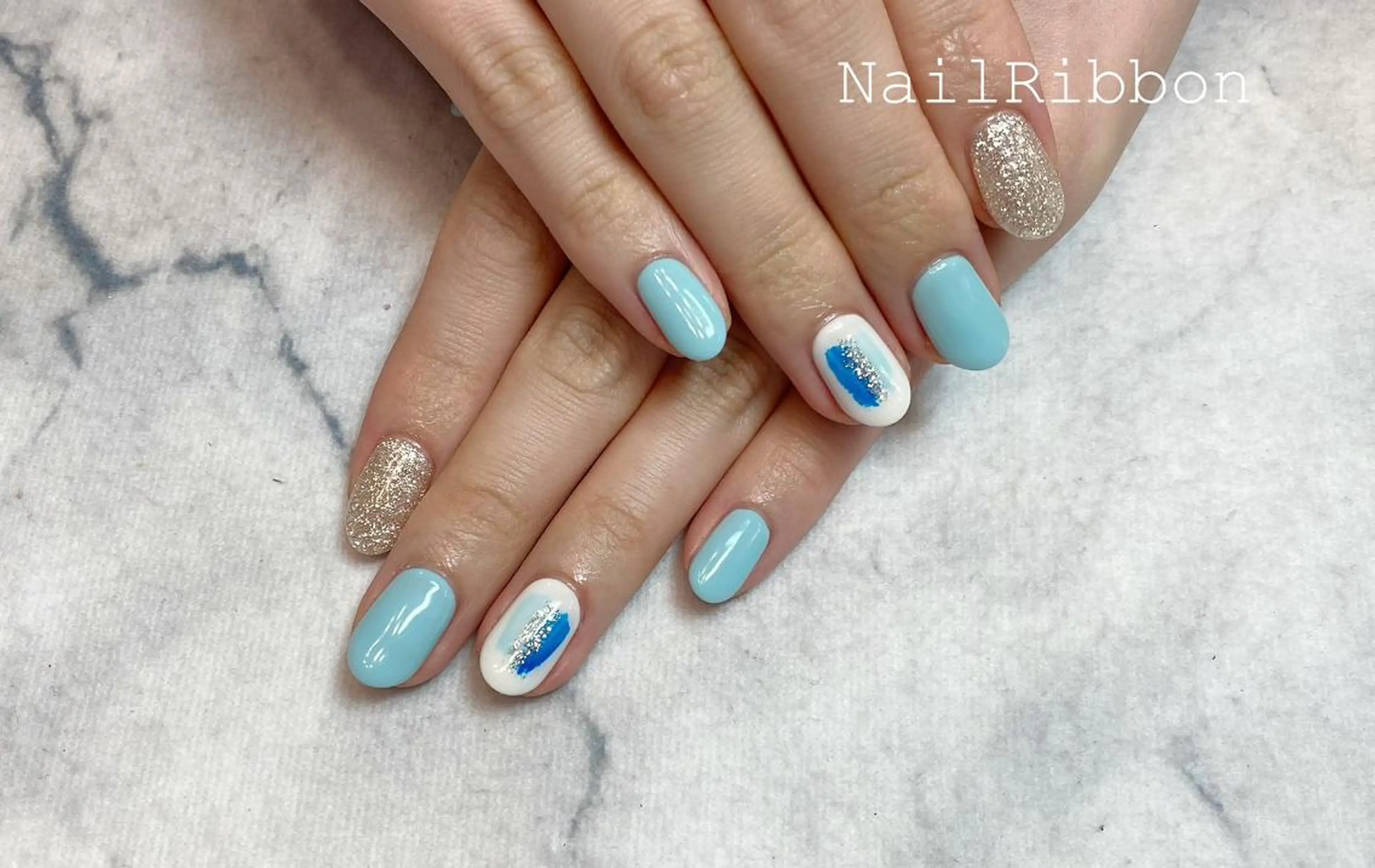 ネイル ネイルリボン 受付スタッフのネイルデザイン