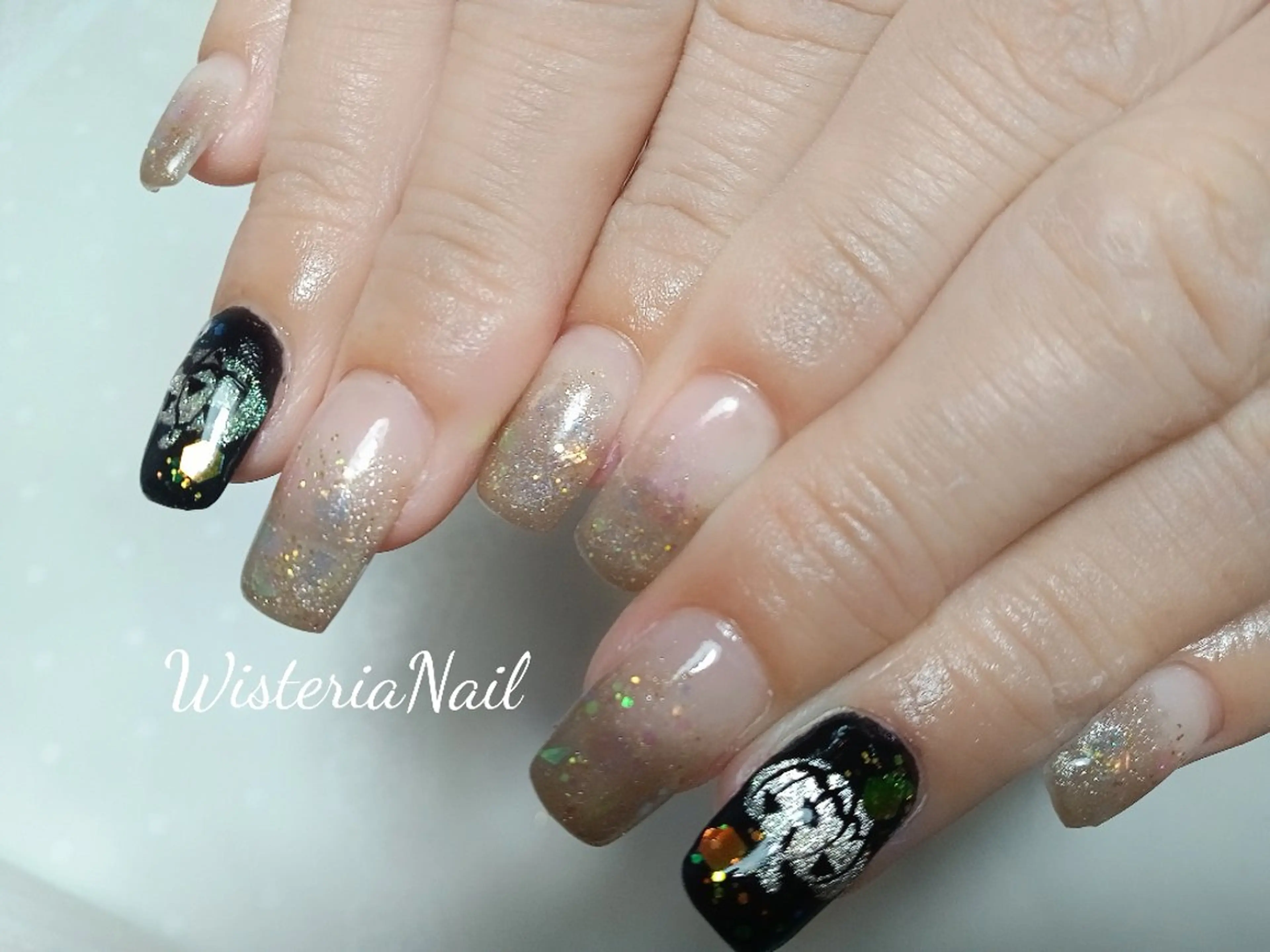 ネイル ハロウィン キラキラネイル マグネットネイル Wisteria Nail_Yukieのネイルデザイン