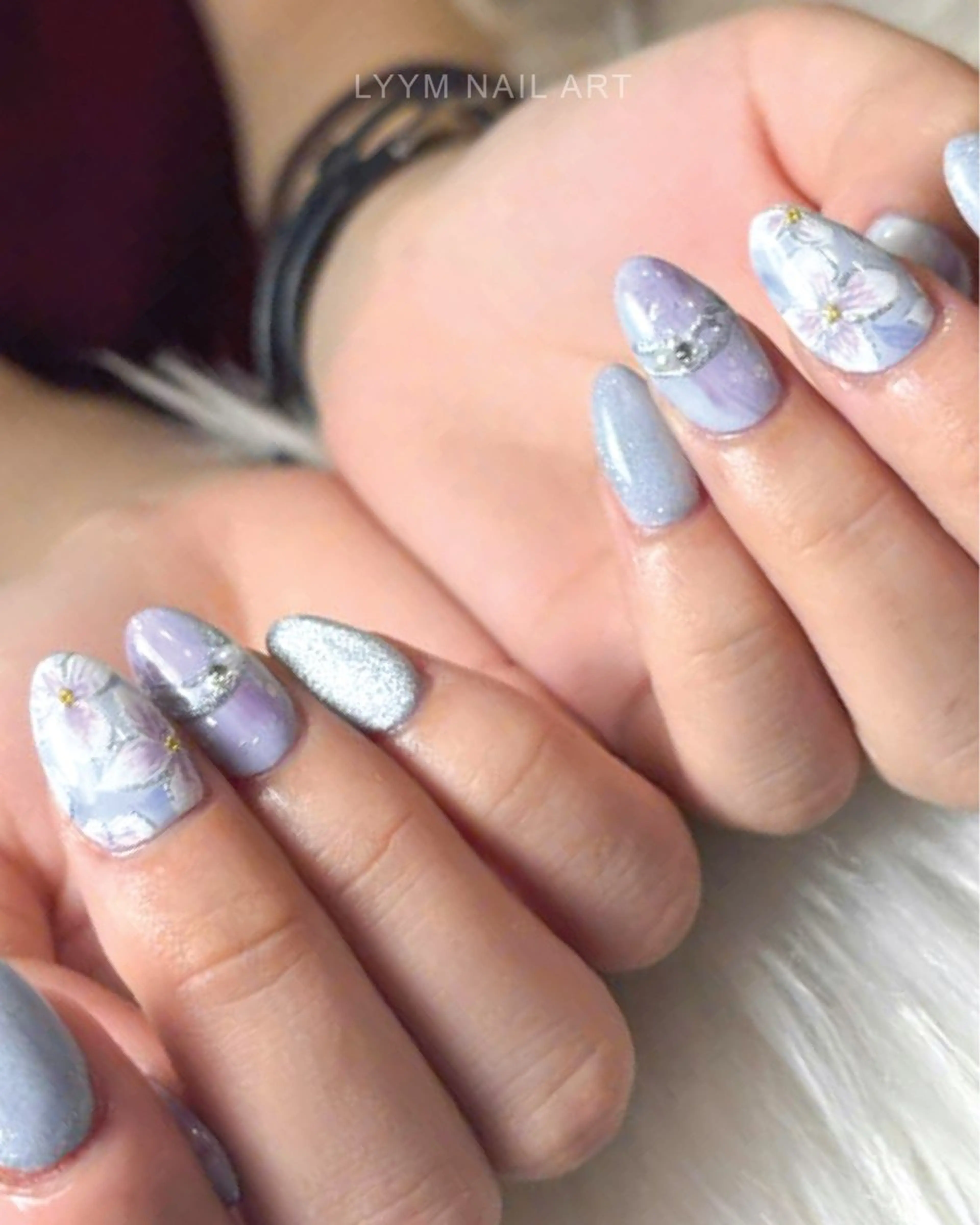 ネイル フラワーネイル 韓国ネイル ラメ(グリッター) パステルネイル パープル LYYM Salonのネイルデザイン