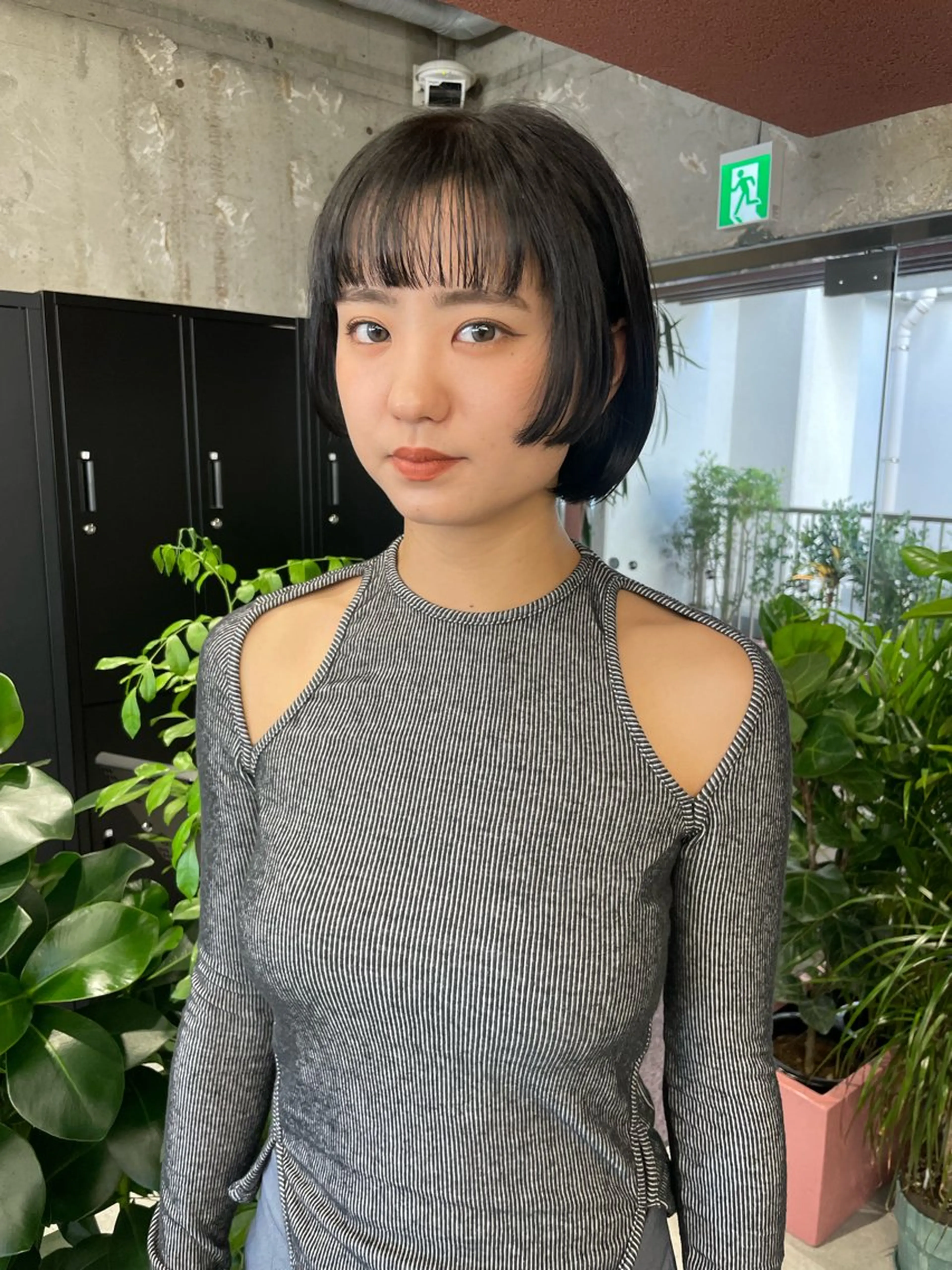 ショート MIFA レイヤー／パーマのヘアスタイル