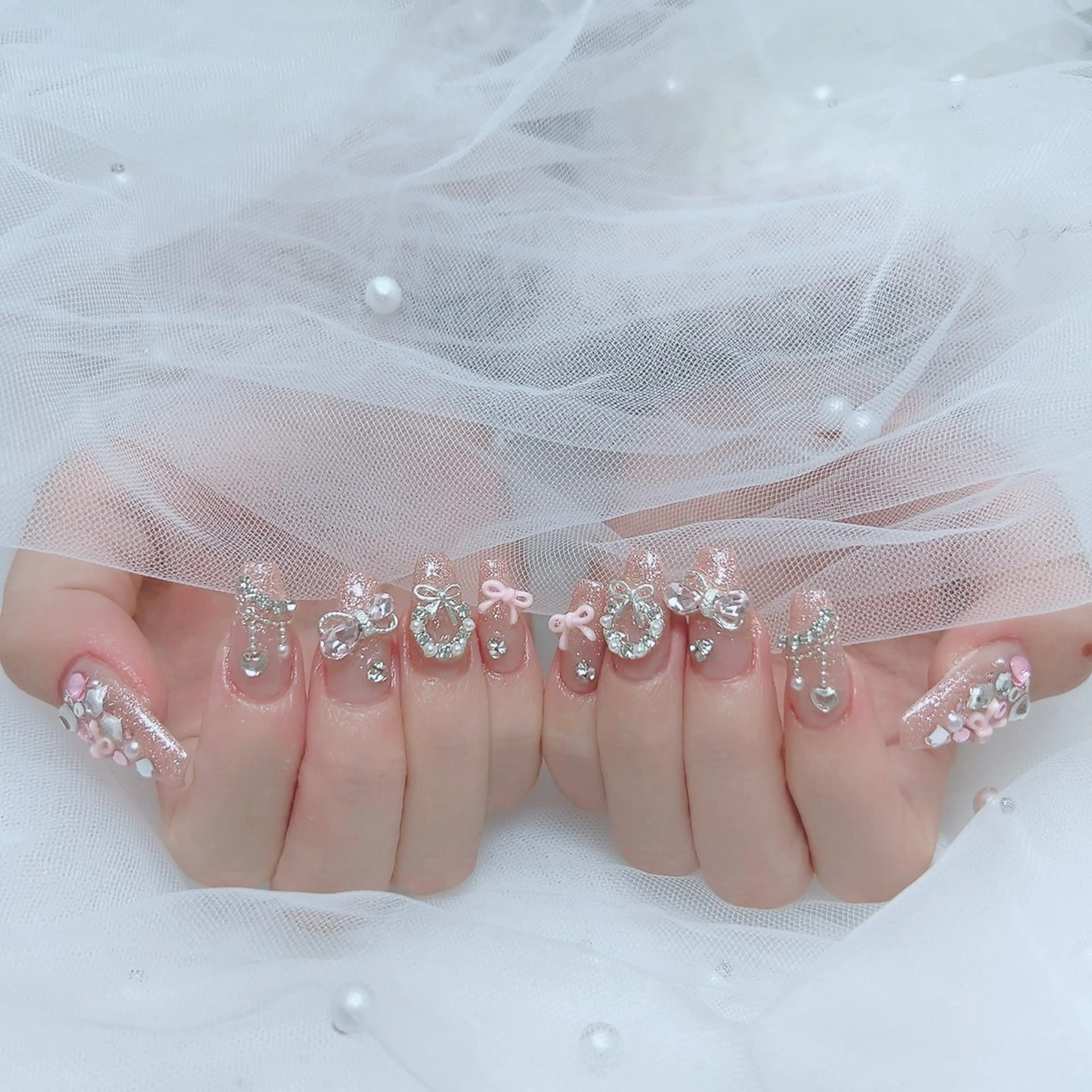 🩷チップ長だし🩷10本アート(手描きなし)パーツ・シールつけ放題の写真