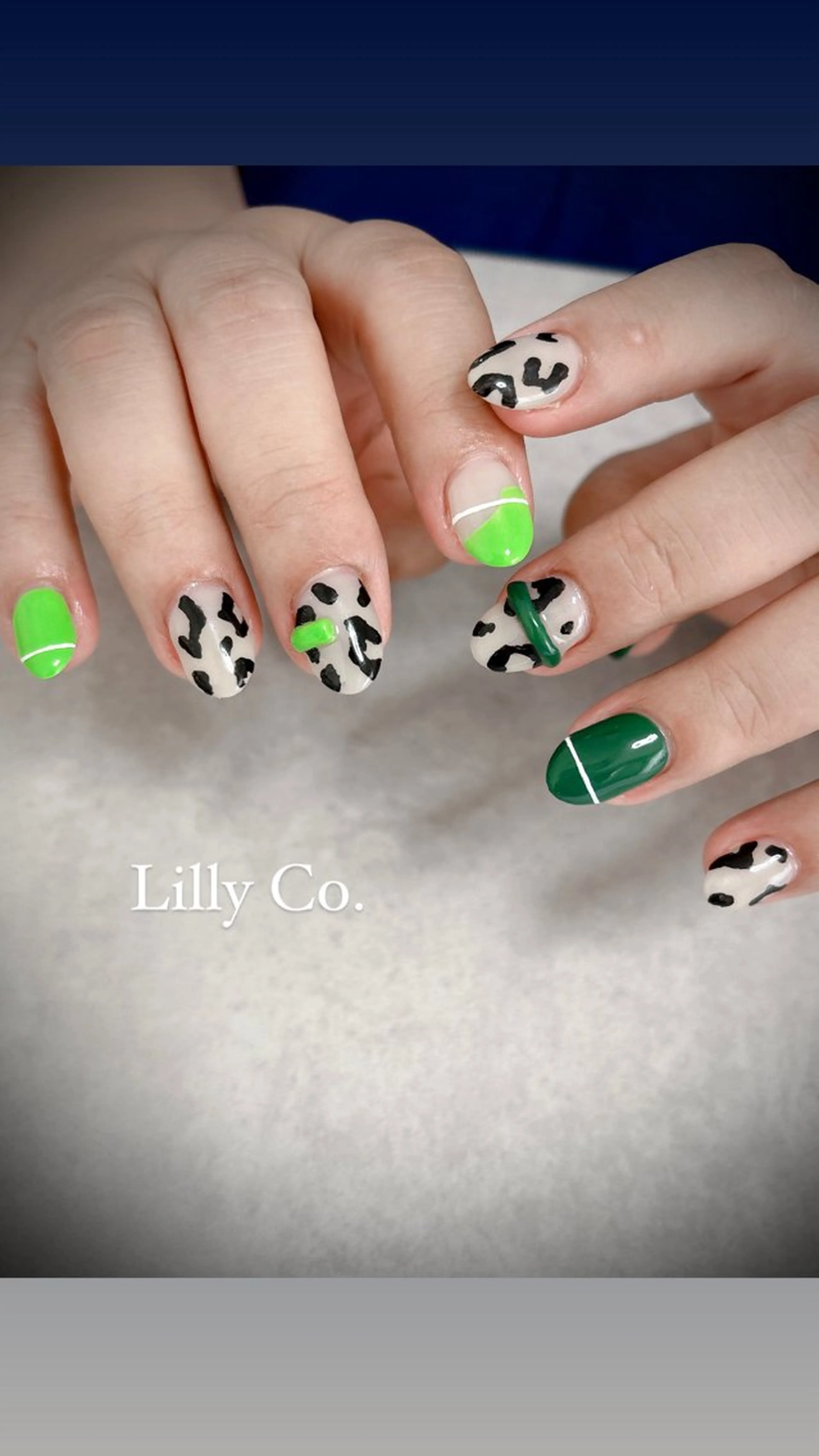 ネイル アニマル柄 グリーン ハンドネイル ハンドケア Lilly Co.のネイルデザイン
