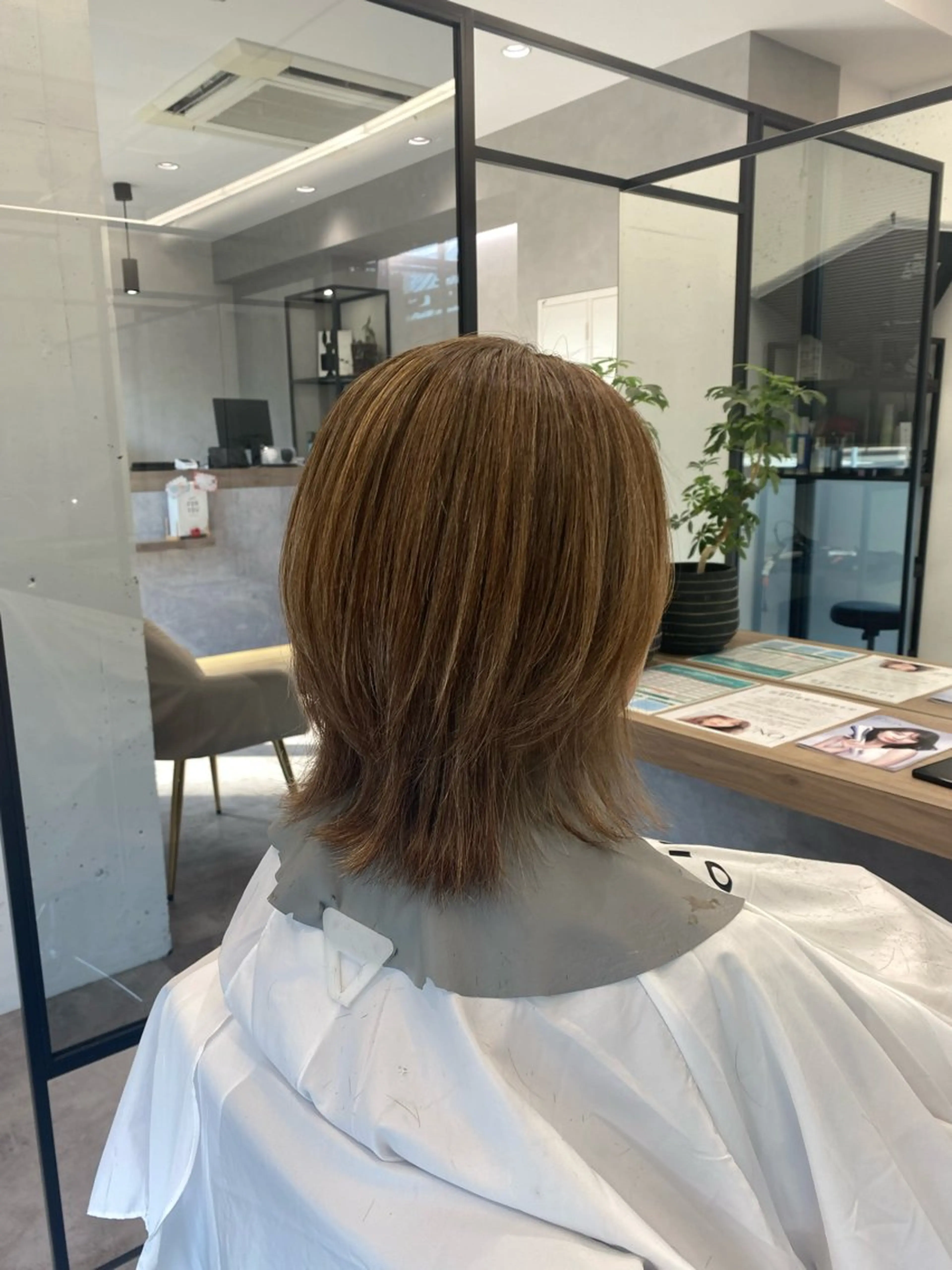 ミディアム カット COCO .のヘアスタイル