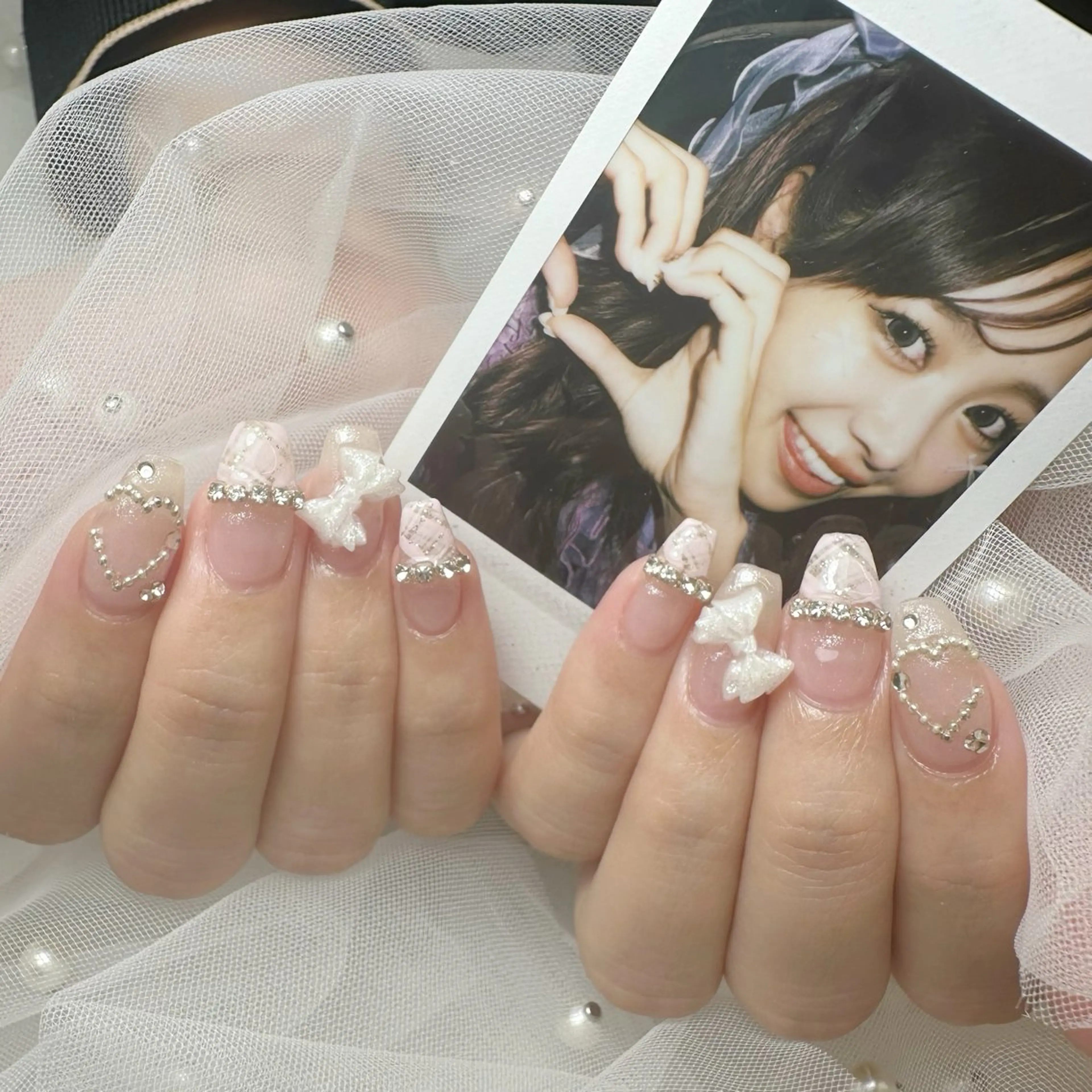 ネイル リボン nami🐰🎀 堺筋本町ネイルサロンのネイルデザイン