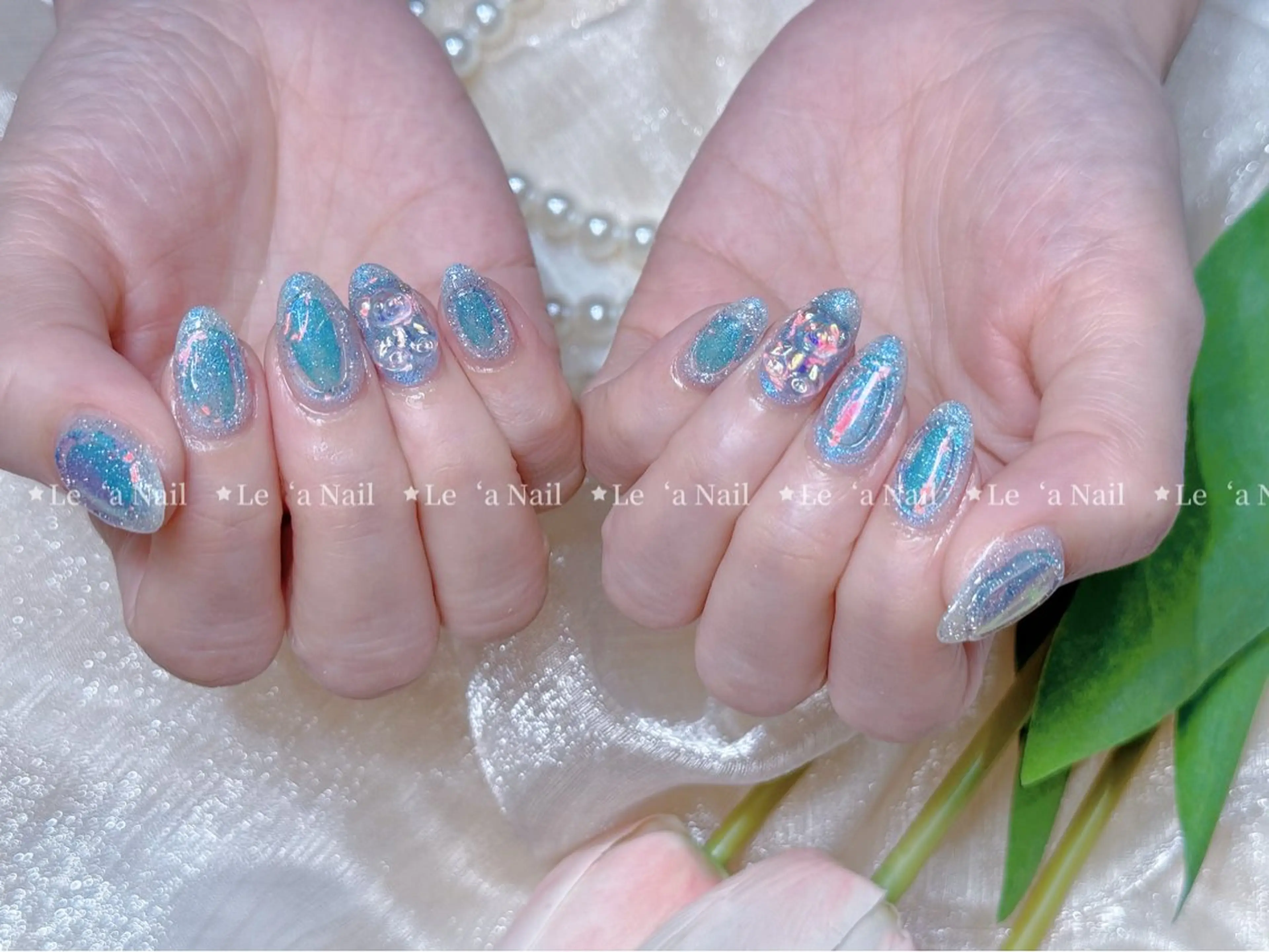 ネイル 氷ネイル・うるうるネイル ハンドネイル ハンドケア Luxe Nail Salonのネイルデザイン