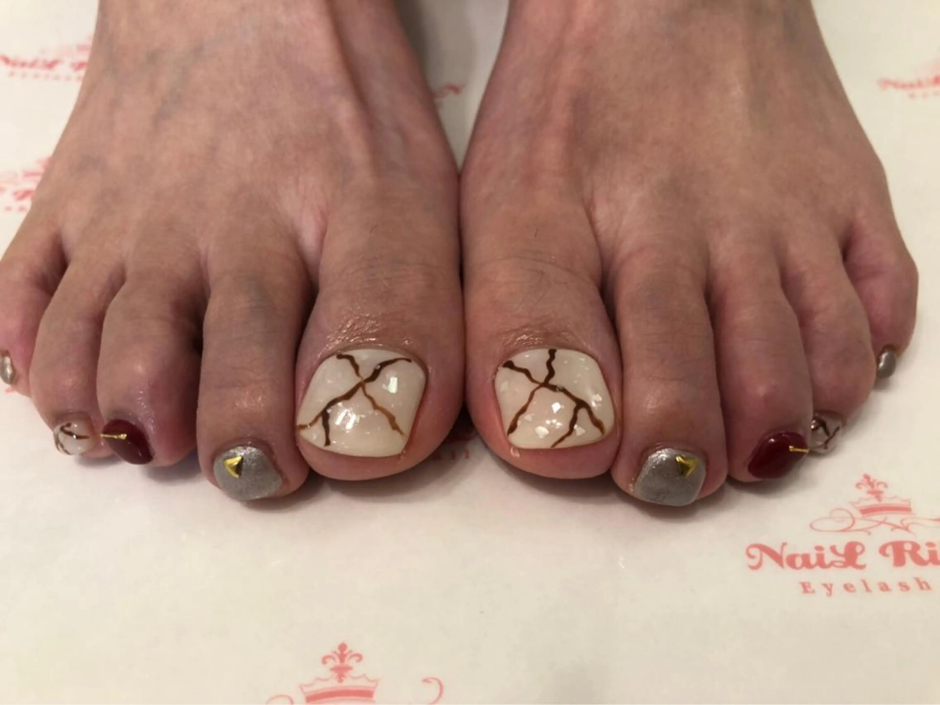 ネイル 春ネイル ネイルリボン 受付スタッフのネイルデザイン