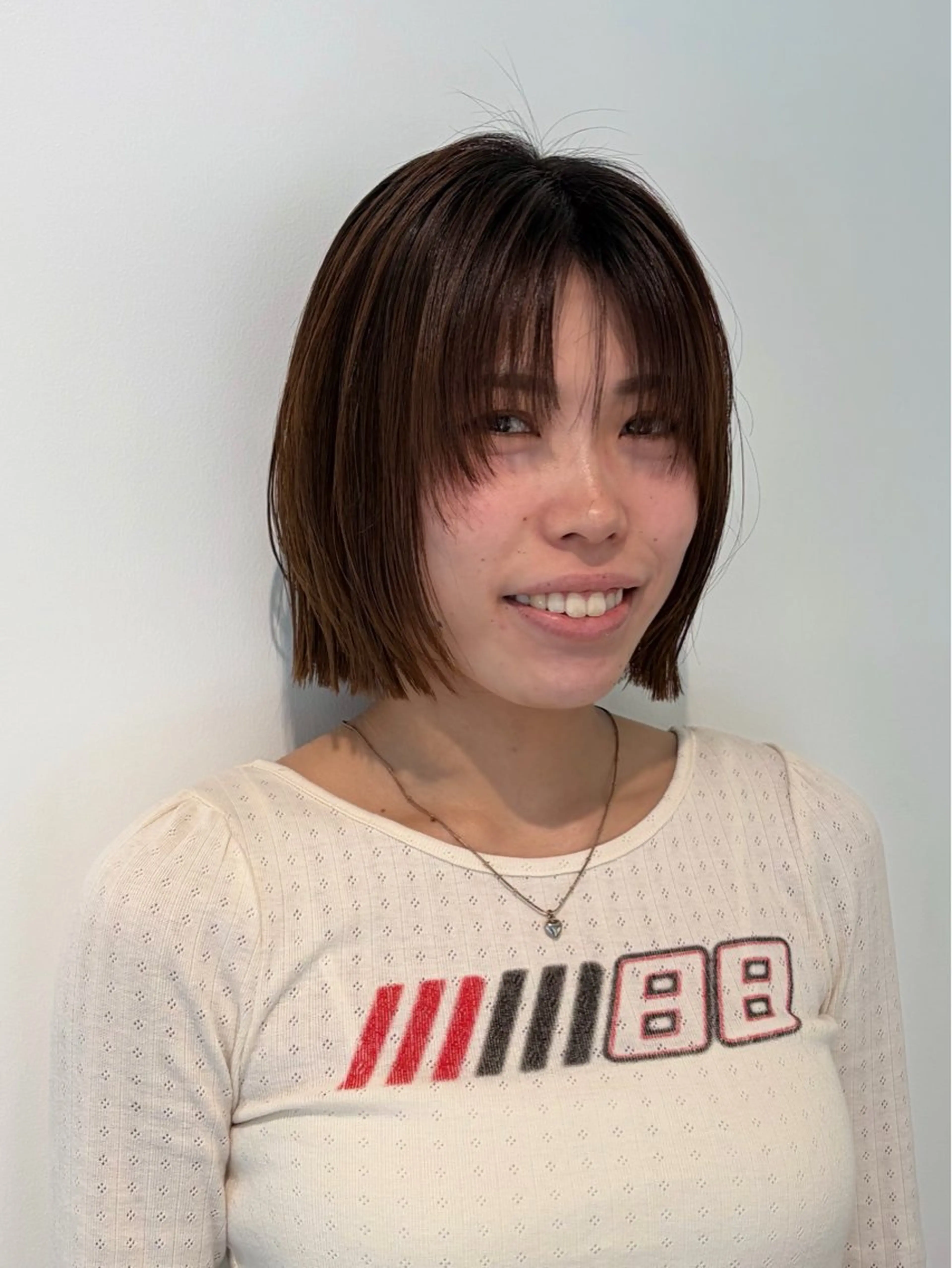 ショート カラー ボブ レイヤーカット カット ヘアカラー トリートメント サエ/ レイヤー/パーマのヘアスタイル