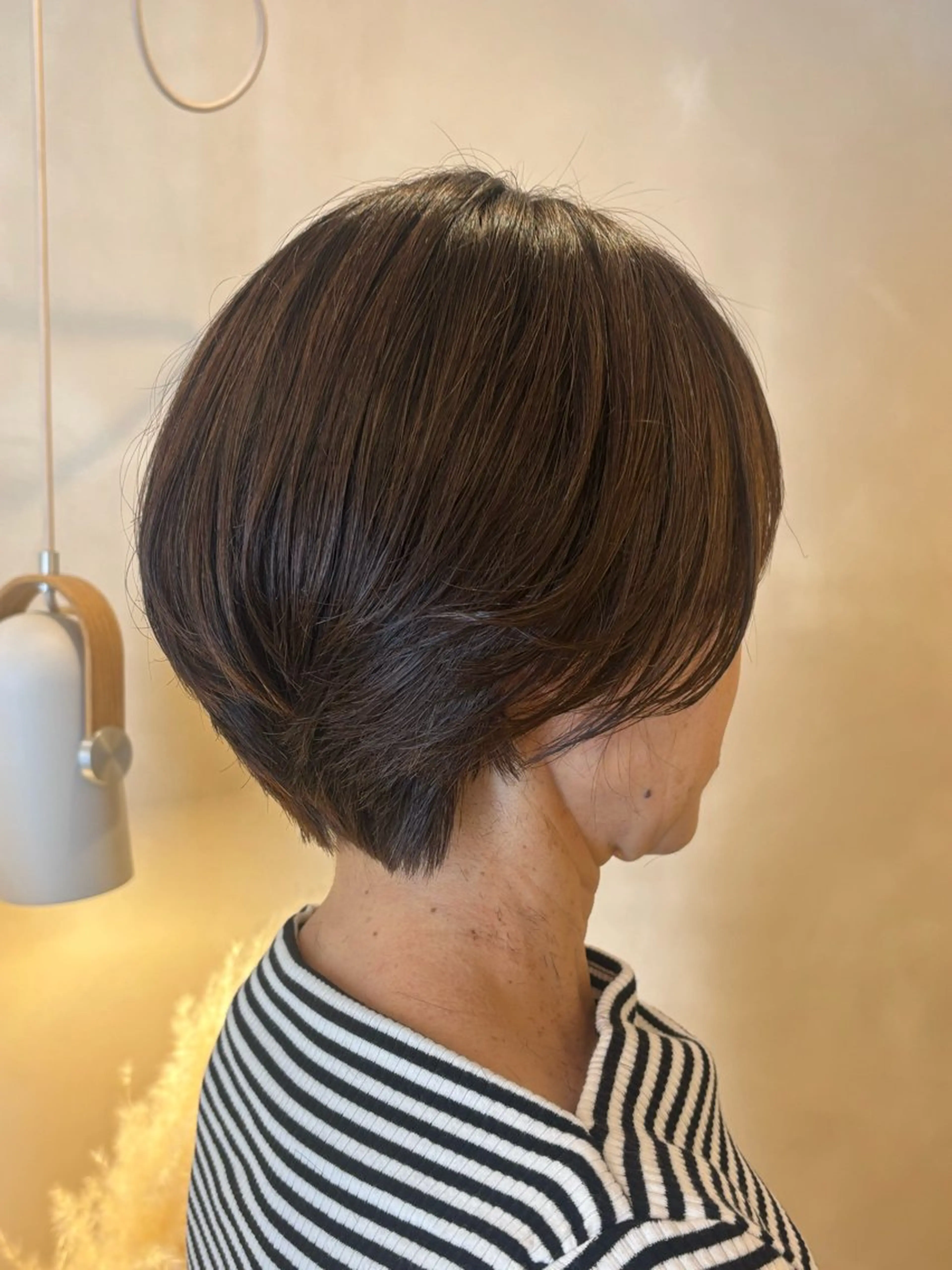 ショート ショートヘア シンバヒナノ/パーマ レイヤー/髪質改善のヘアスタイル