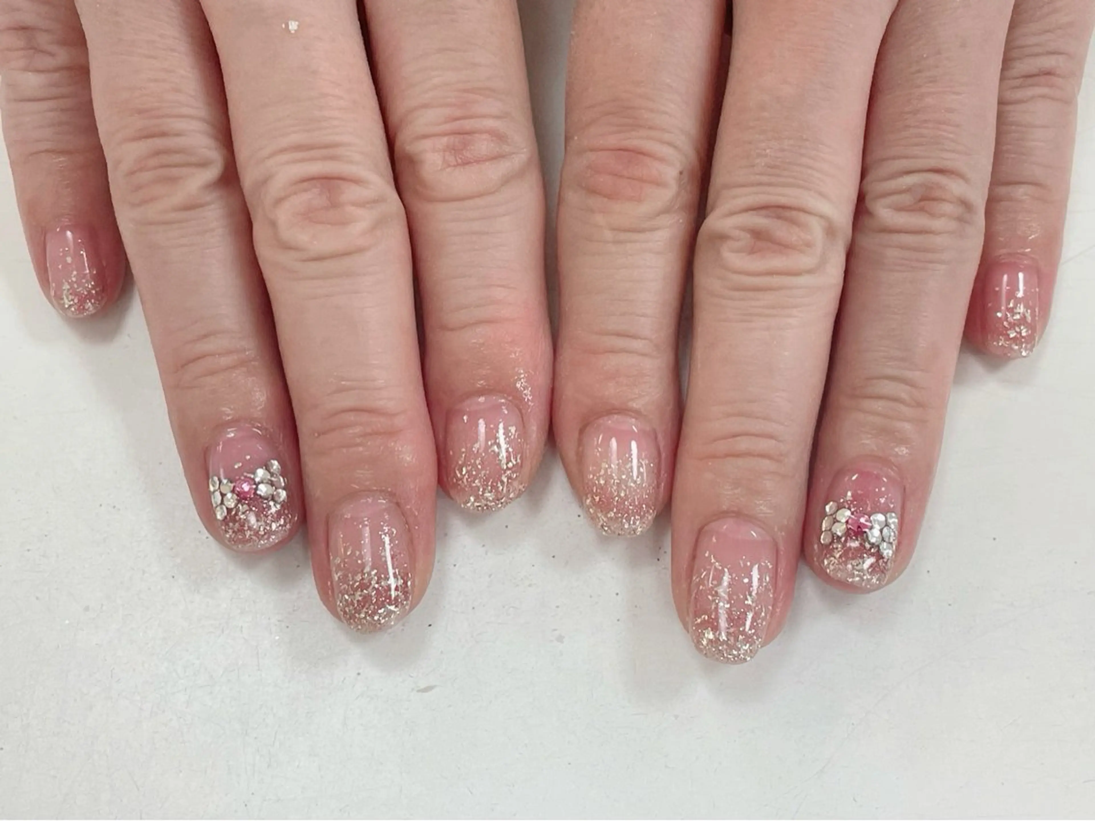 ネイル グラデーション ラメ(グリッター) ラメグラデーション ピンク リボン clear yayoiのネイルデザイン