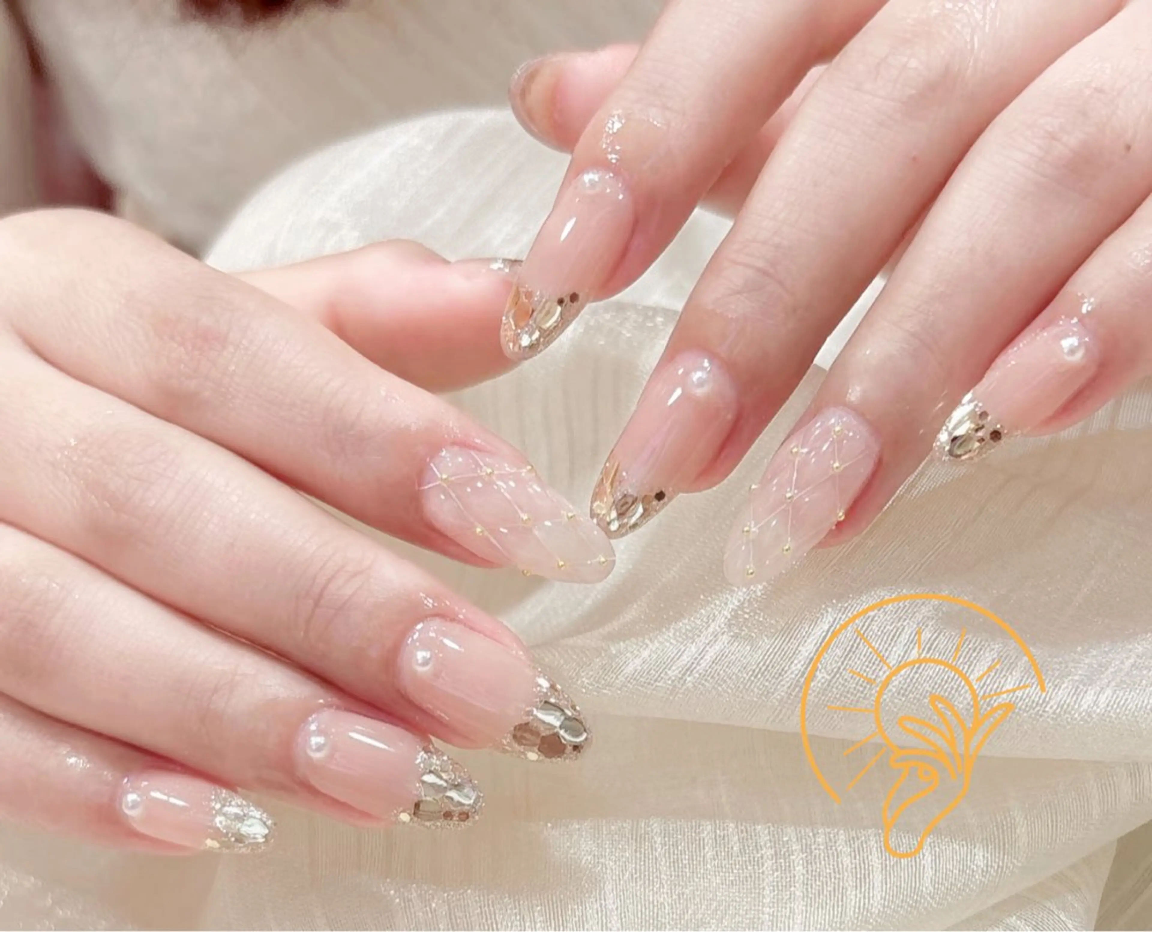 ネイル チークネイル 長さ出し フラワーネイル フレンチネイル ガーリー ハンドネイル ハンドケア Sun Nail 池袋のエステ・リラクイメージ