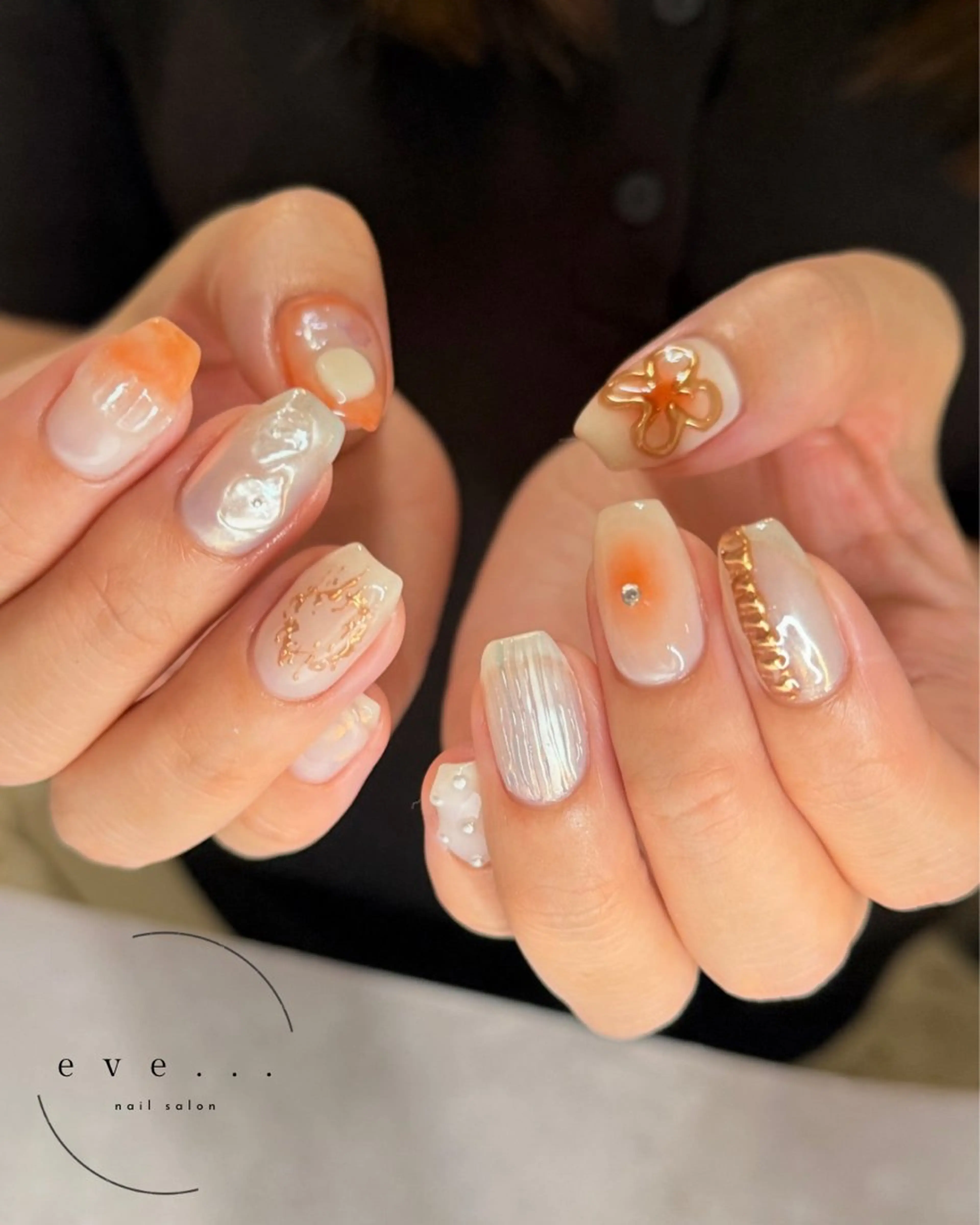 ネイル オレンジ 夏ネイル ハンドネイル nail salon eve...のネイルデザイン