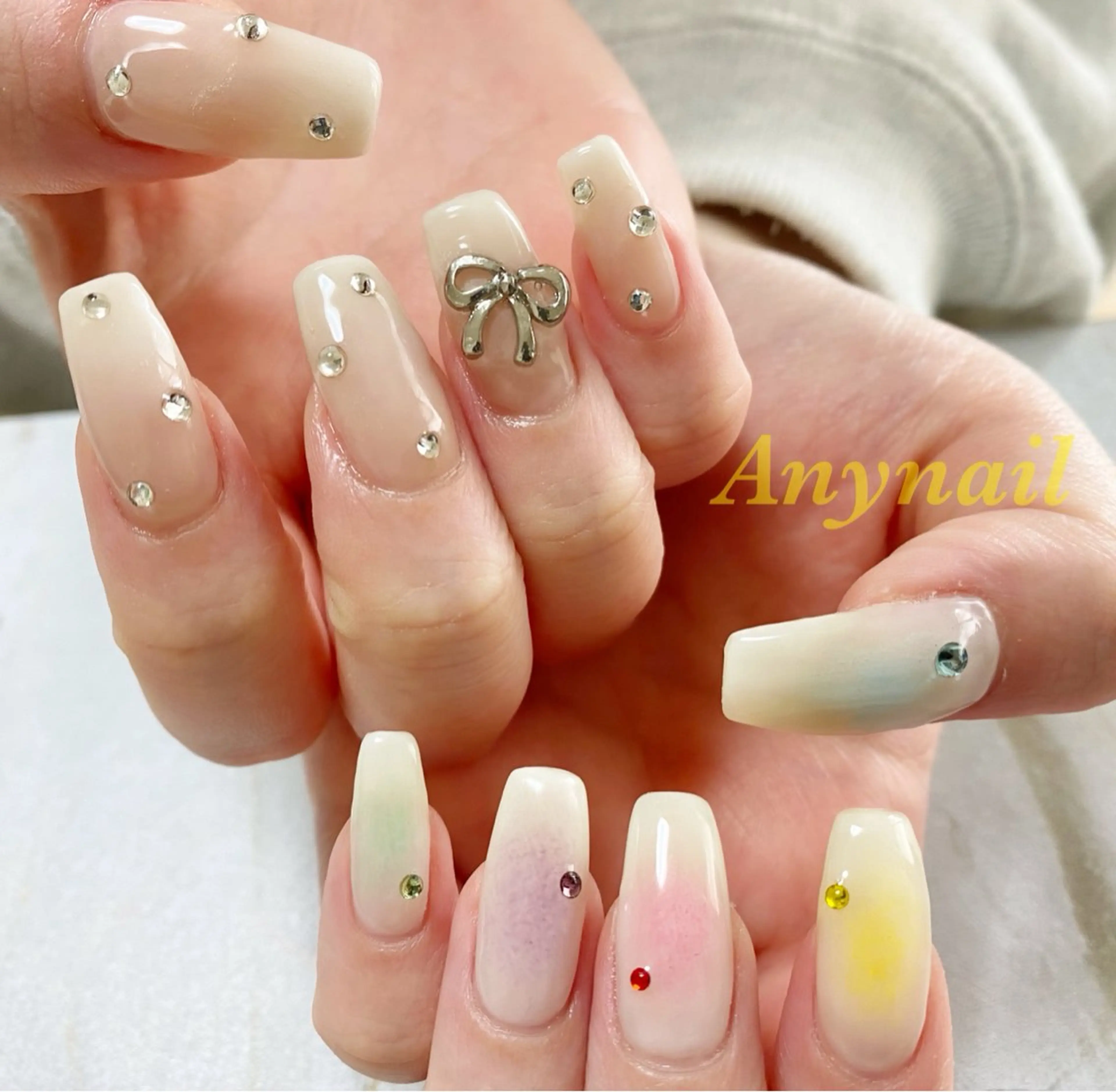 ネイル ブルー チークネイル オフィスネイル リボン 岩澤 恵子のネイルデザイン