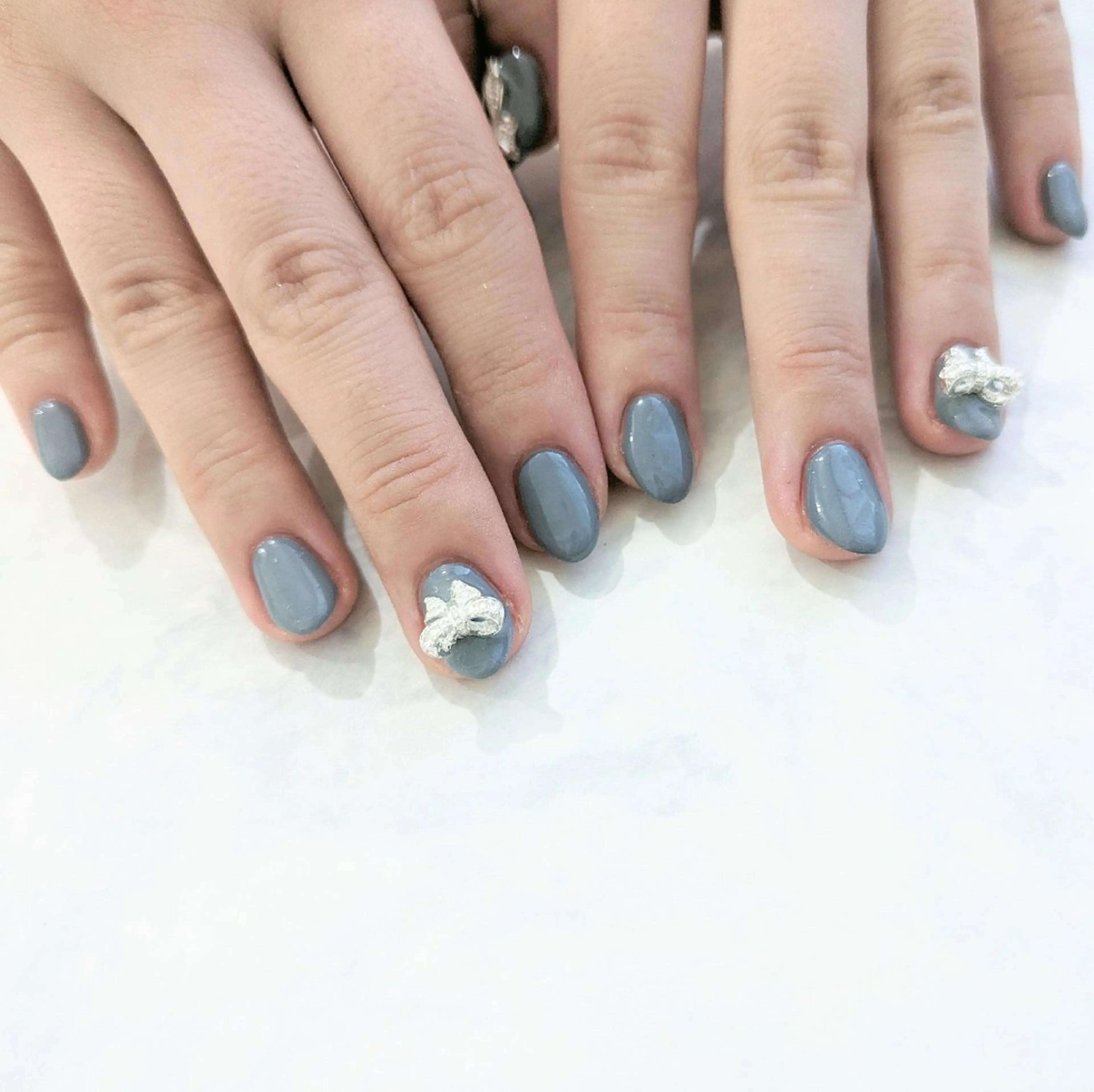 ネイル リボン Gerbera Nailistのネイルデザイン