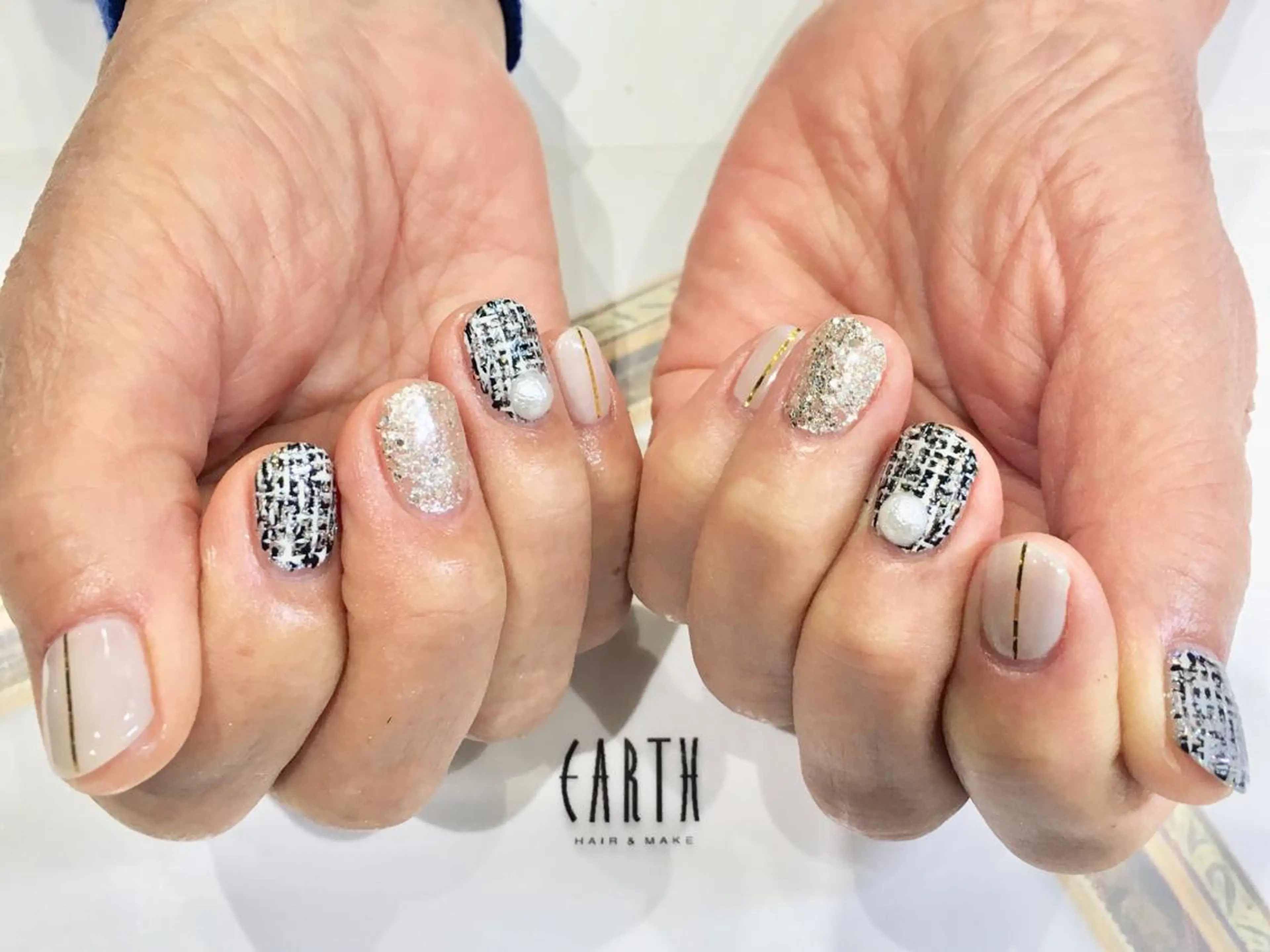 ネイル ツイードネイル ホワイト 佐藤 まりえのネイルデザイン