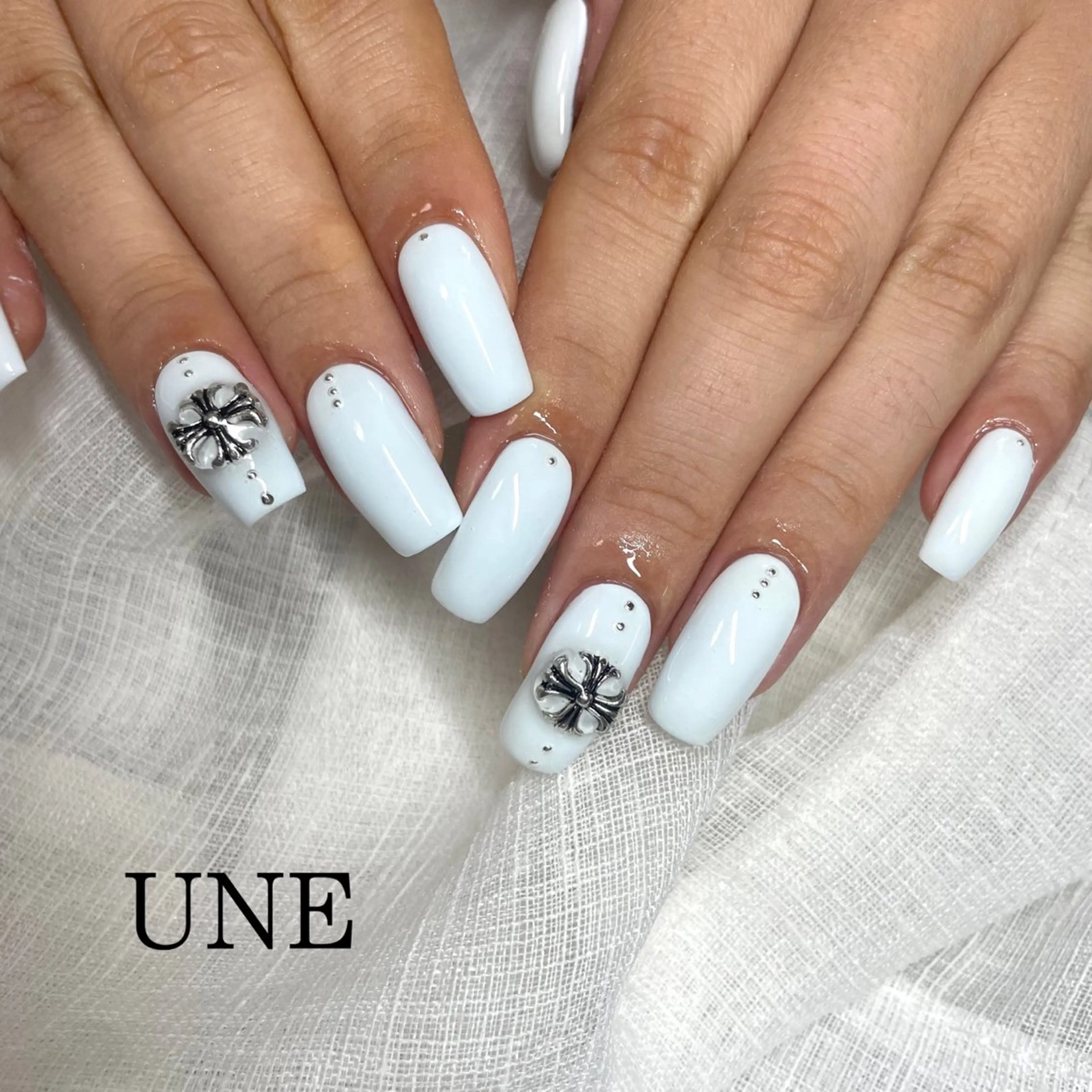 ネイル ブルー ワンカラーネイル シンプルネイル UNE.【ユヌ】 Jr.NANAのネイルデザイン