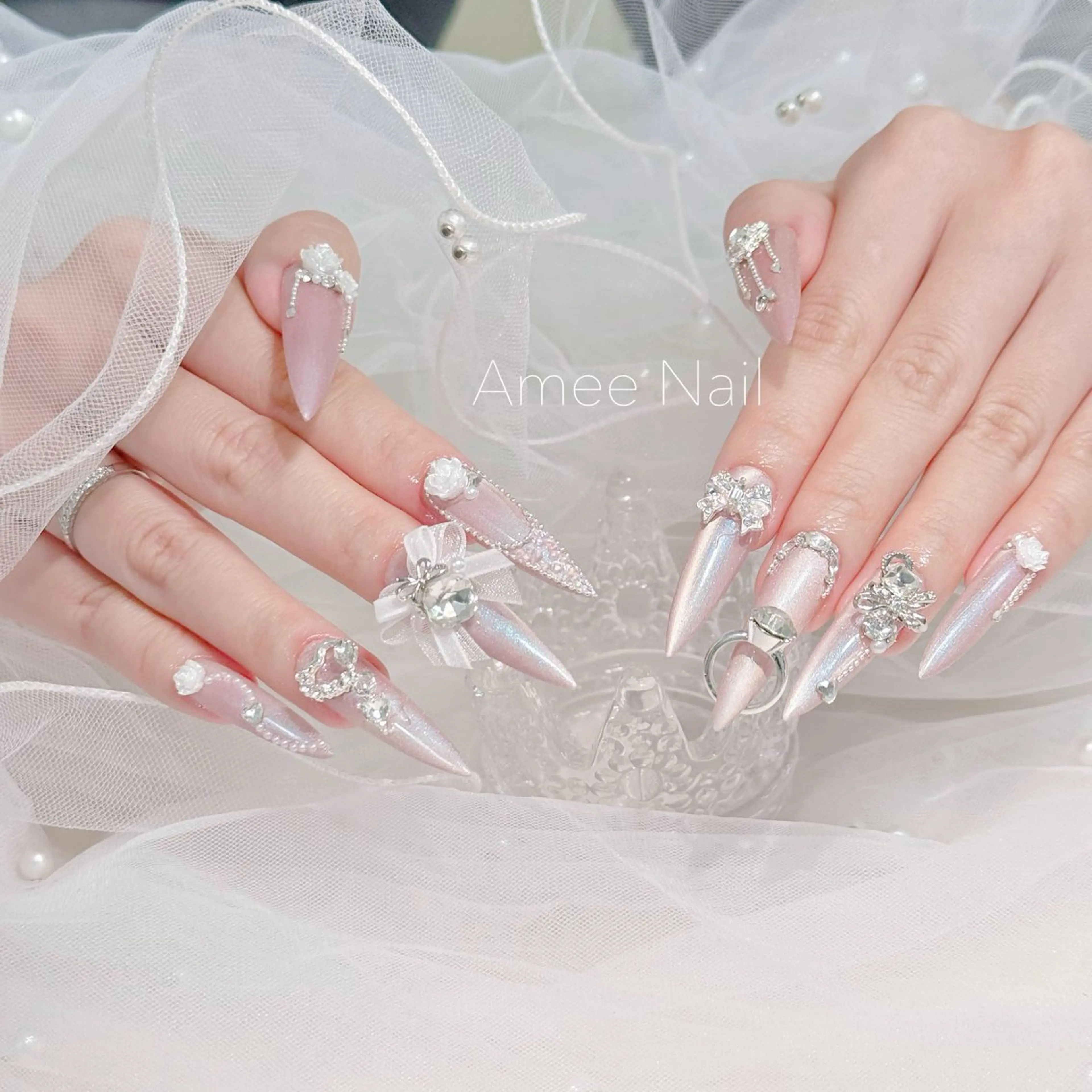 ネイル 成人式 ロングネイル マグネットネイル 大理石ネイル(マーブル) リボン ハンドネイル Amee Nail Salonのネイルデザイン