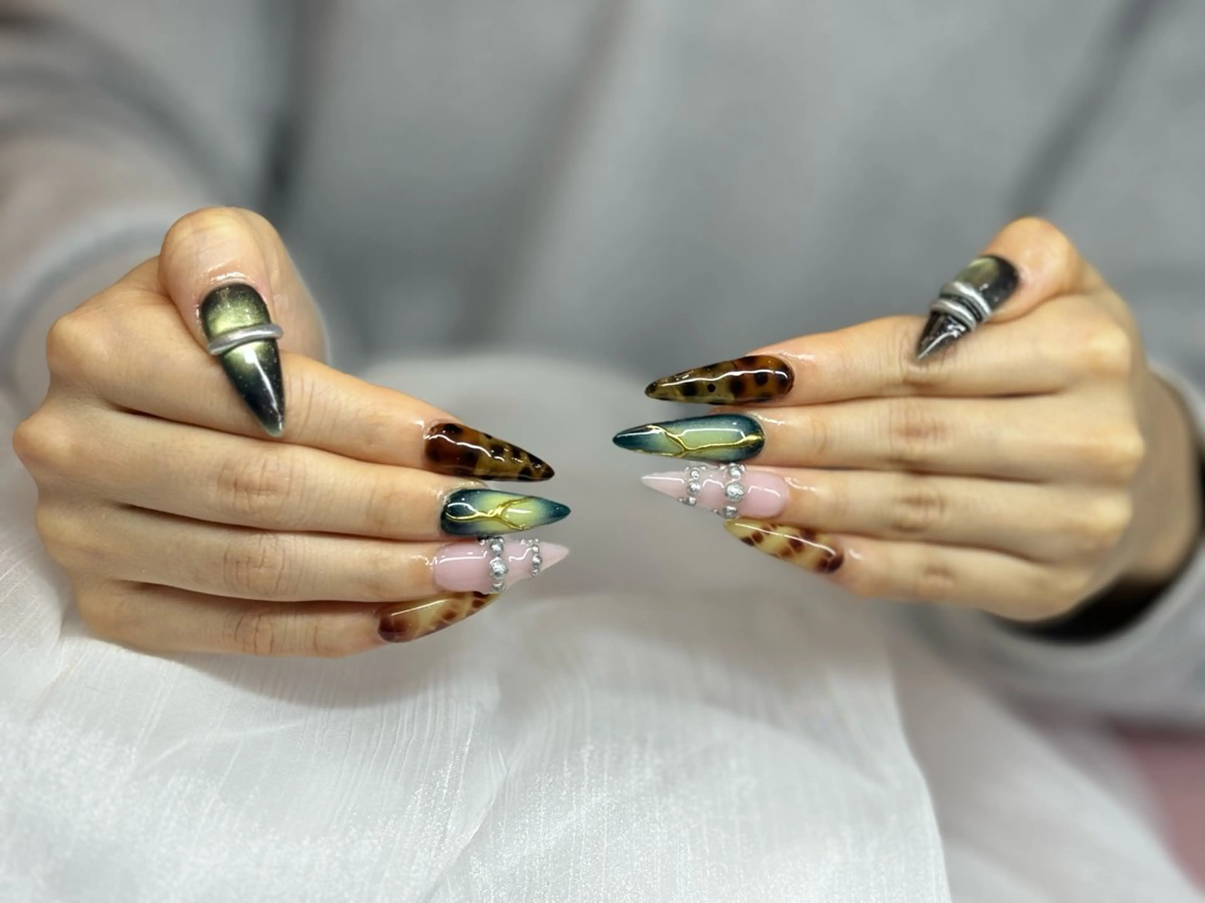 セミロング ティキ Pono Nailsのネイルデザイン