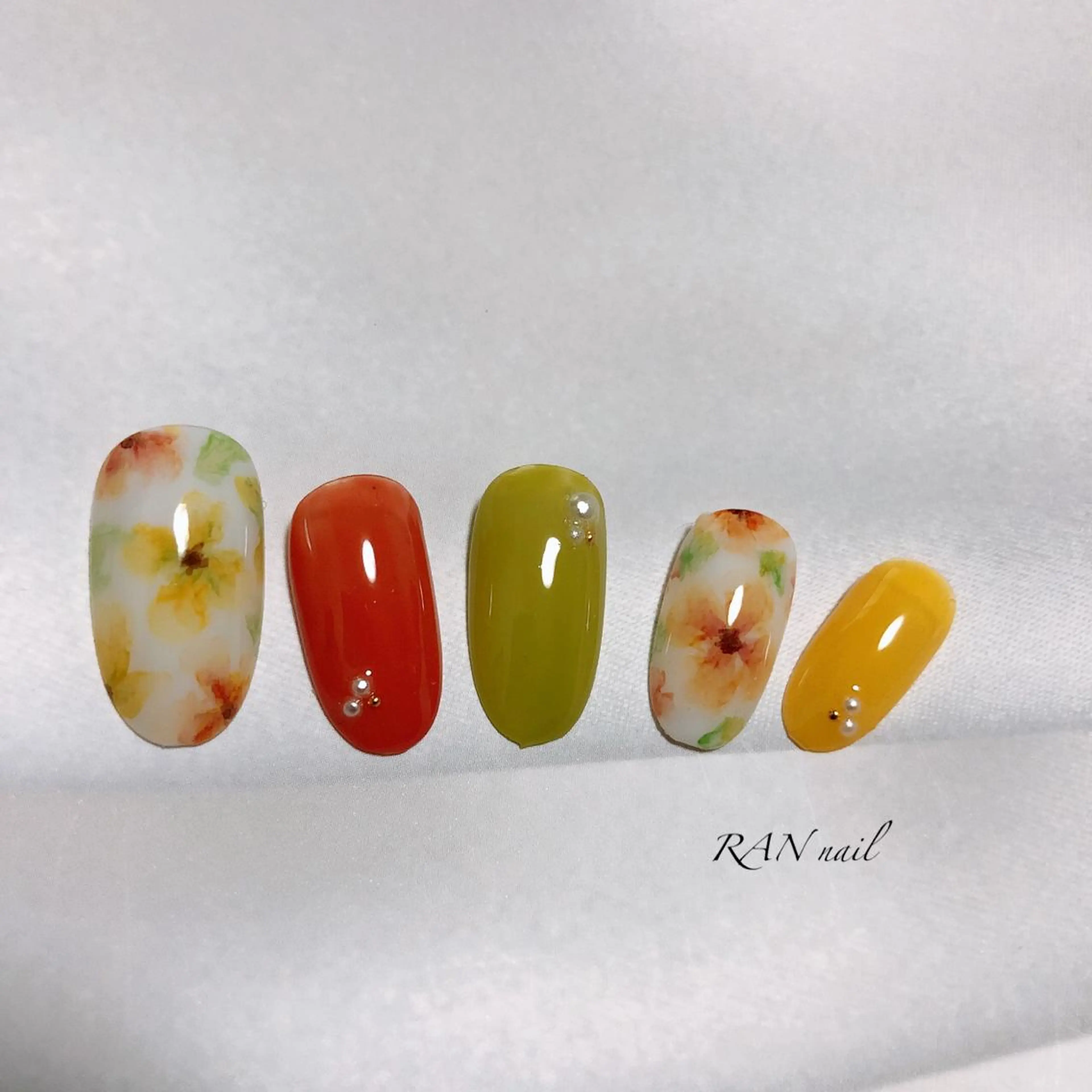 ネイル アートネイル フラワーネイル フットネイル オフィスネイル オレンジ ハンドネイル フットネイル RAN nail 〜ランネイル〜所属・RAN nailのネイルデザイン