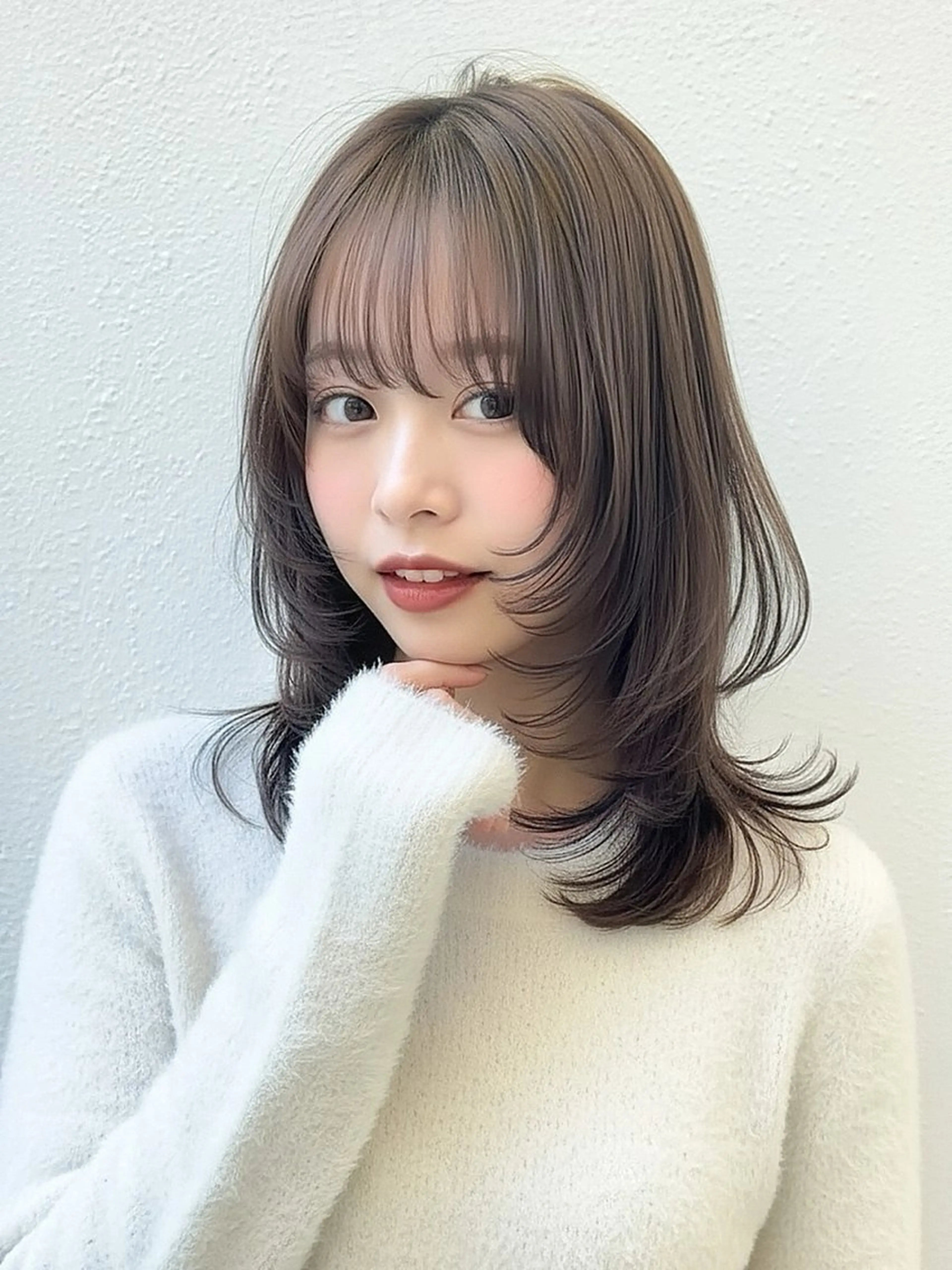 セミロング 韓国レイヤーカット KOUKIのヘアスタイル