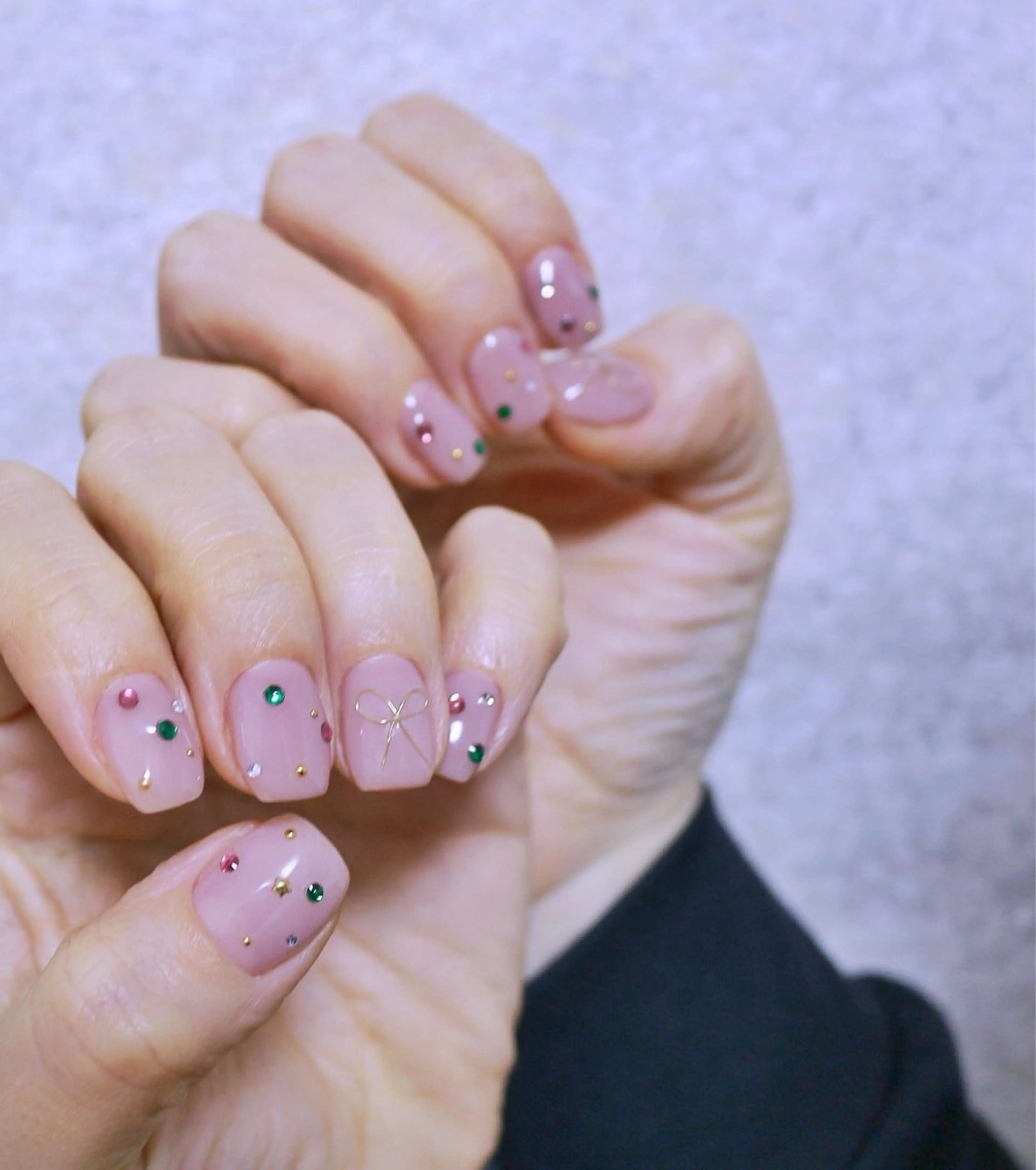 ネイル キラキラネイル ニュアンスネイル ピンク ピンクベージュ リボン ハンドネイル Baku Nailsのネイルデザイン