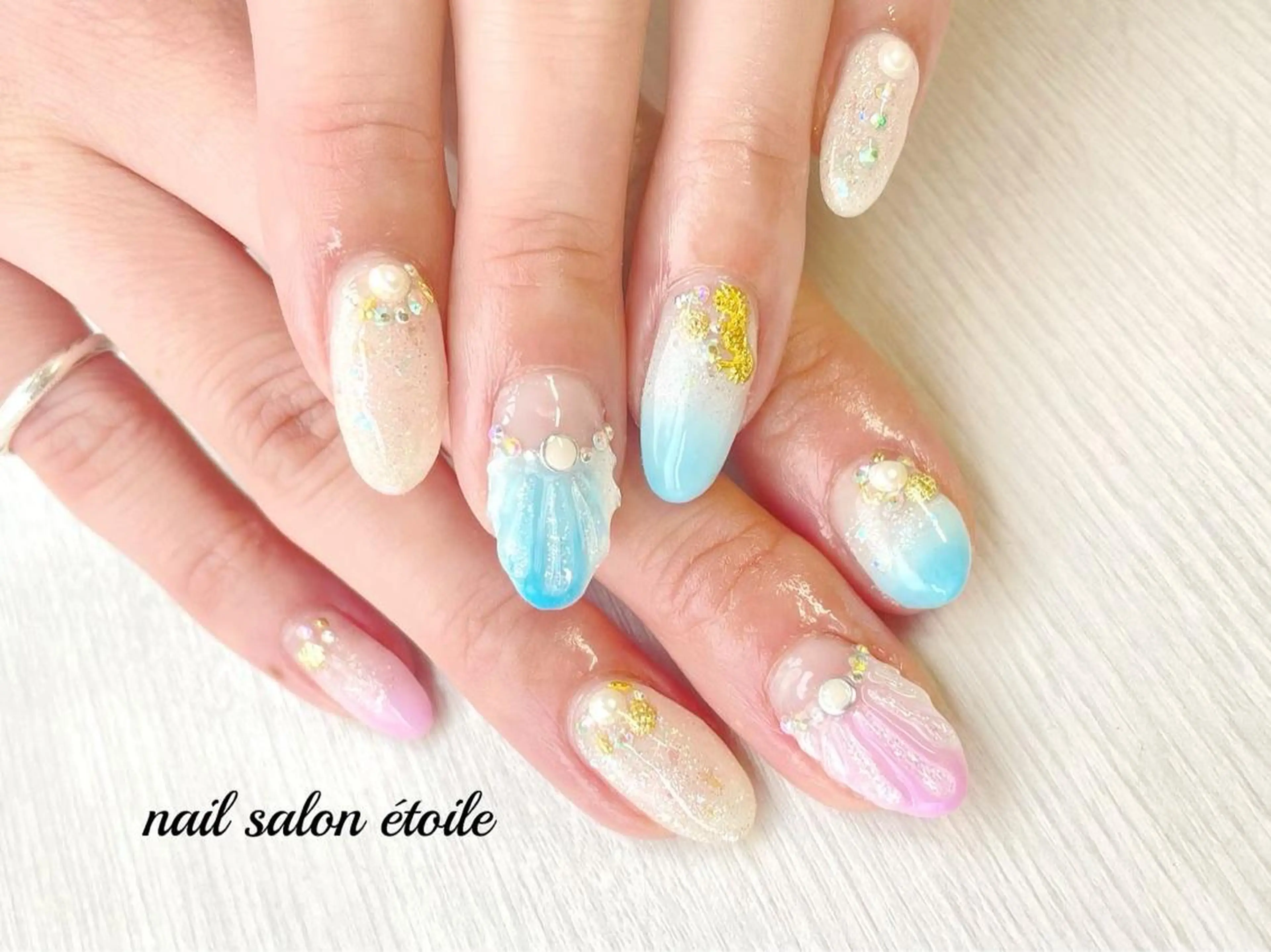 ネイル ブルー ジェルネイル グラデーション 氷ネイル・うるうるネイル キラキラネイル ハンドネイル nail salon étoileのネイルデザイン