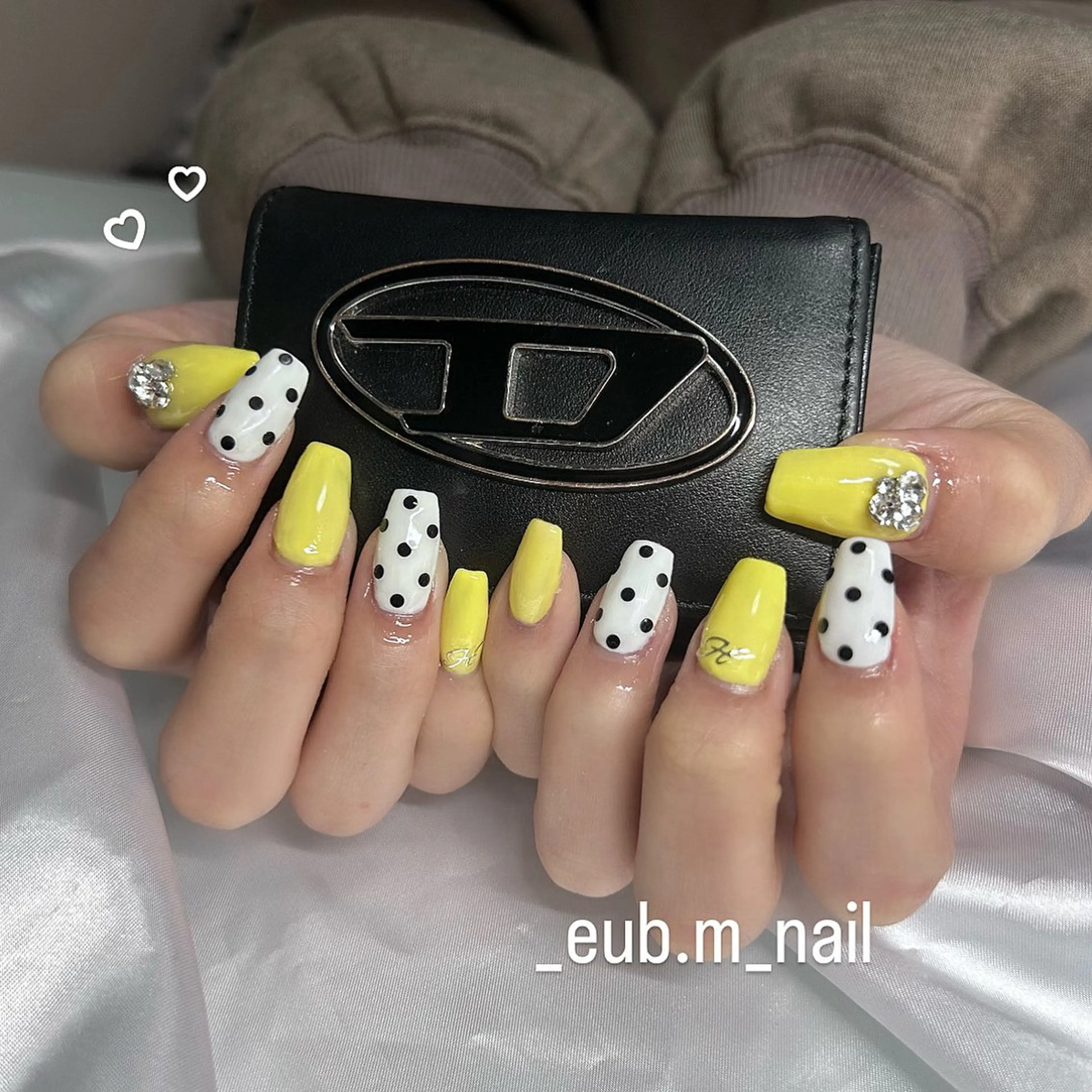 ネイル 春ネイル ホワイト 黄色 深夜ネイルサロン eub.m_nailのネイルデザイン