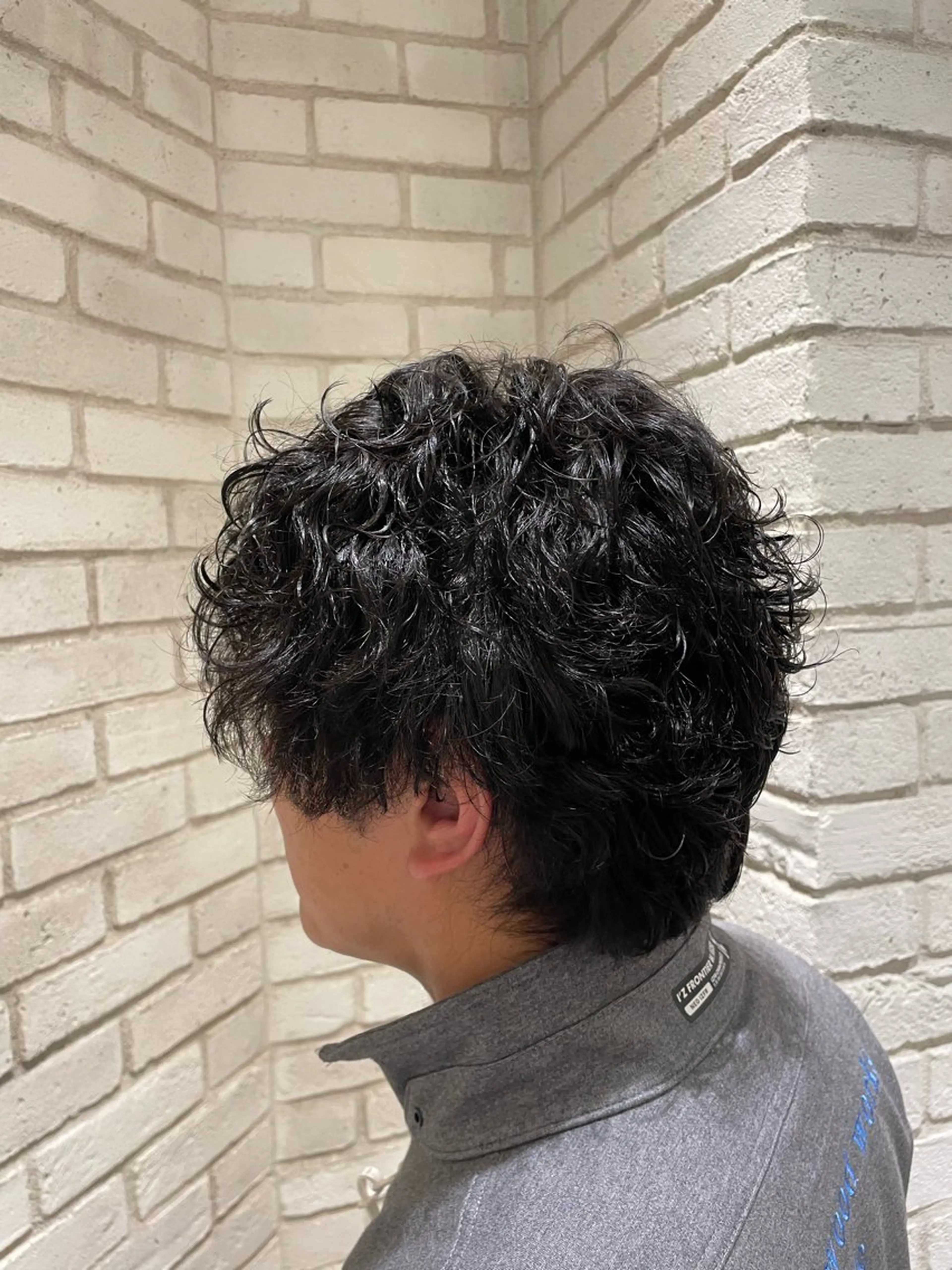 パーマ シモカワ マシロのヘアスタイル