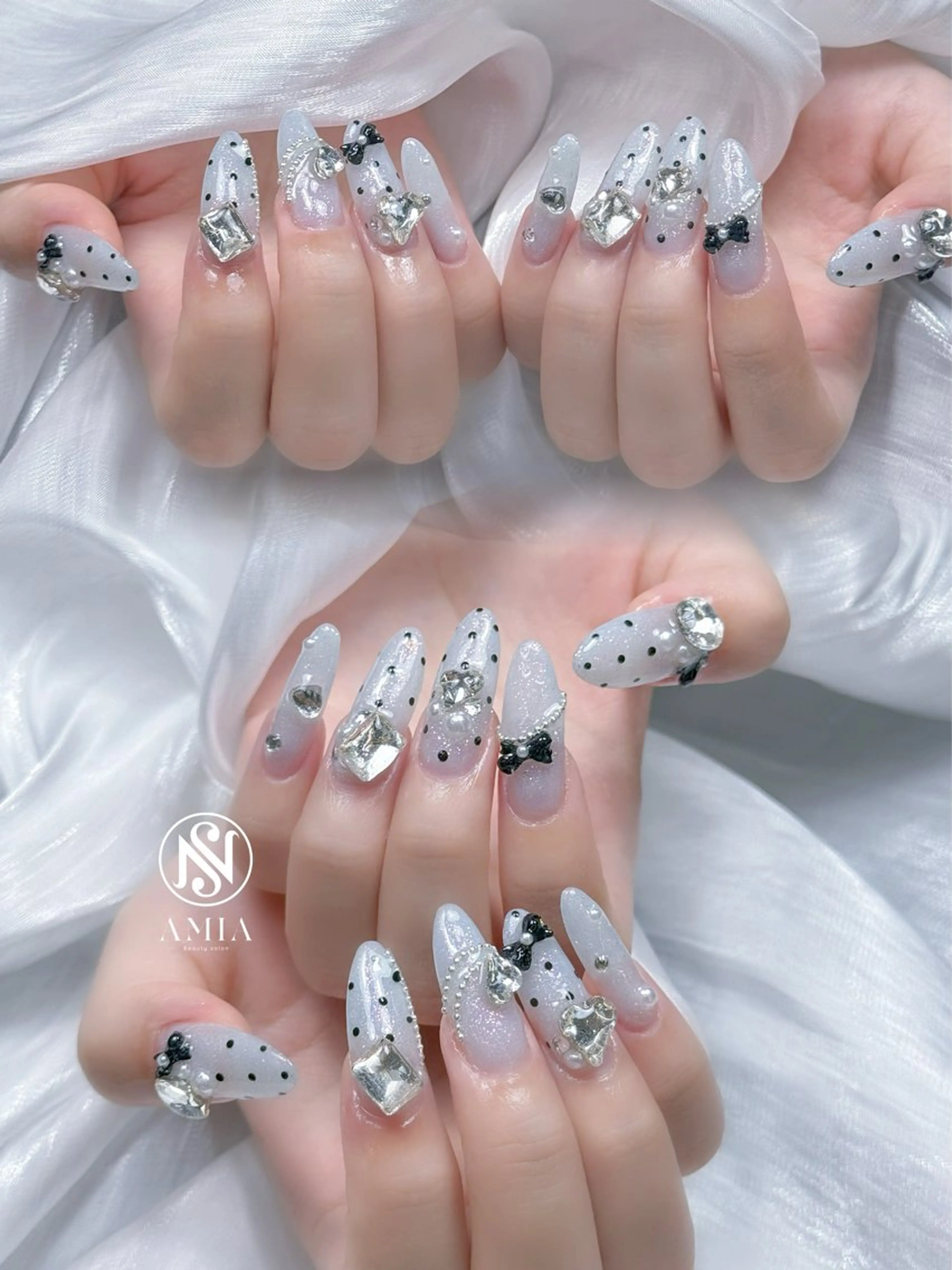 ロング ハンドネイル 🌟AMIA BEAUTY🌟のネイルデザイン