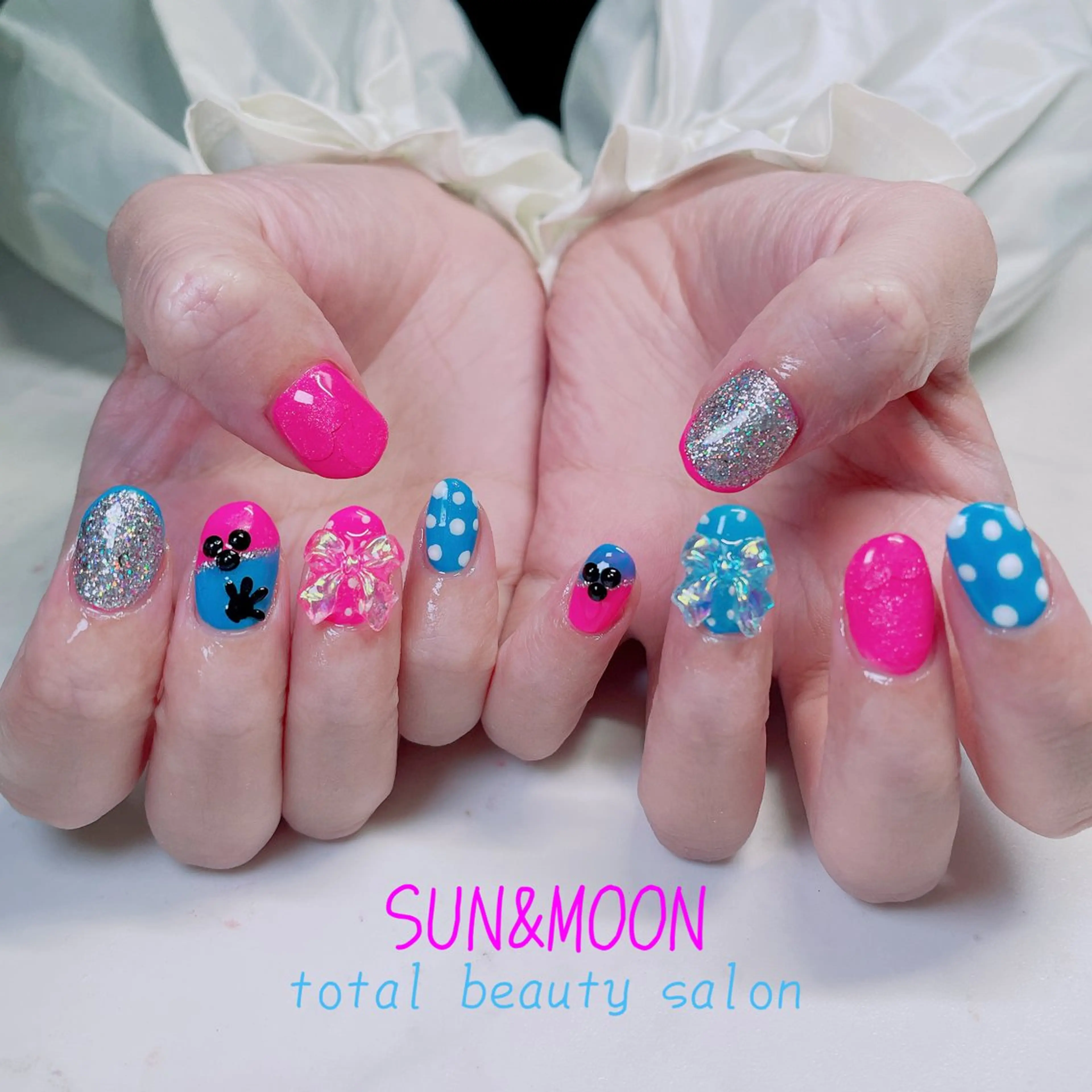 ネイル SUN&MOON REOのネイルデザイン