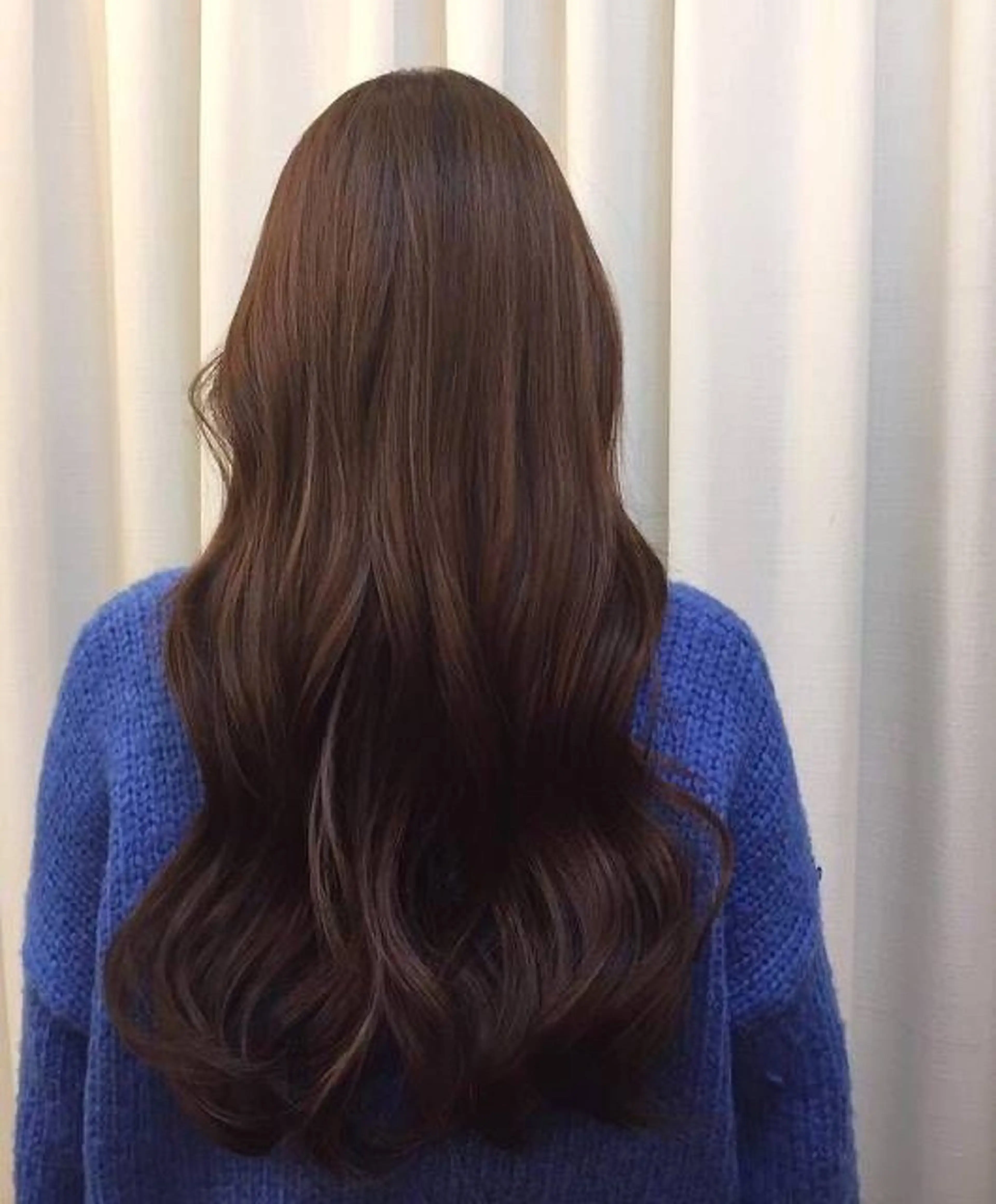 ロング パーマ 曲がる縮毛矯正 センターパートのヘアスタイル