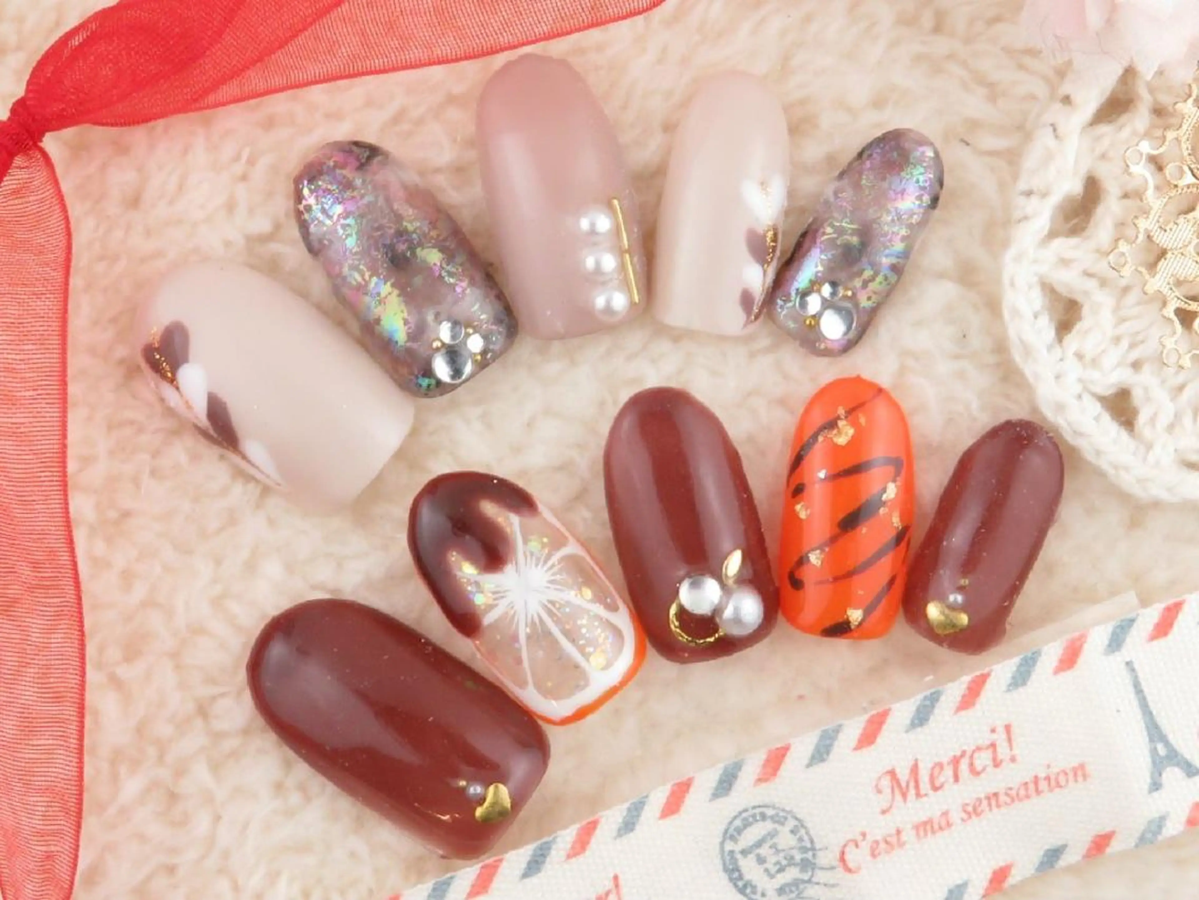 ネイル アートネイル ネイルリボン 受付スタッフのネイルデザイン