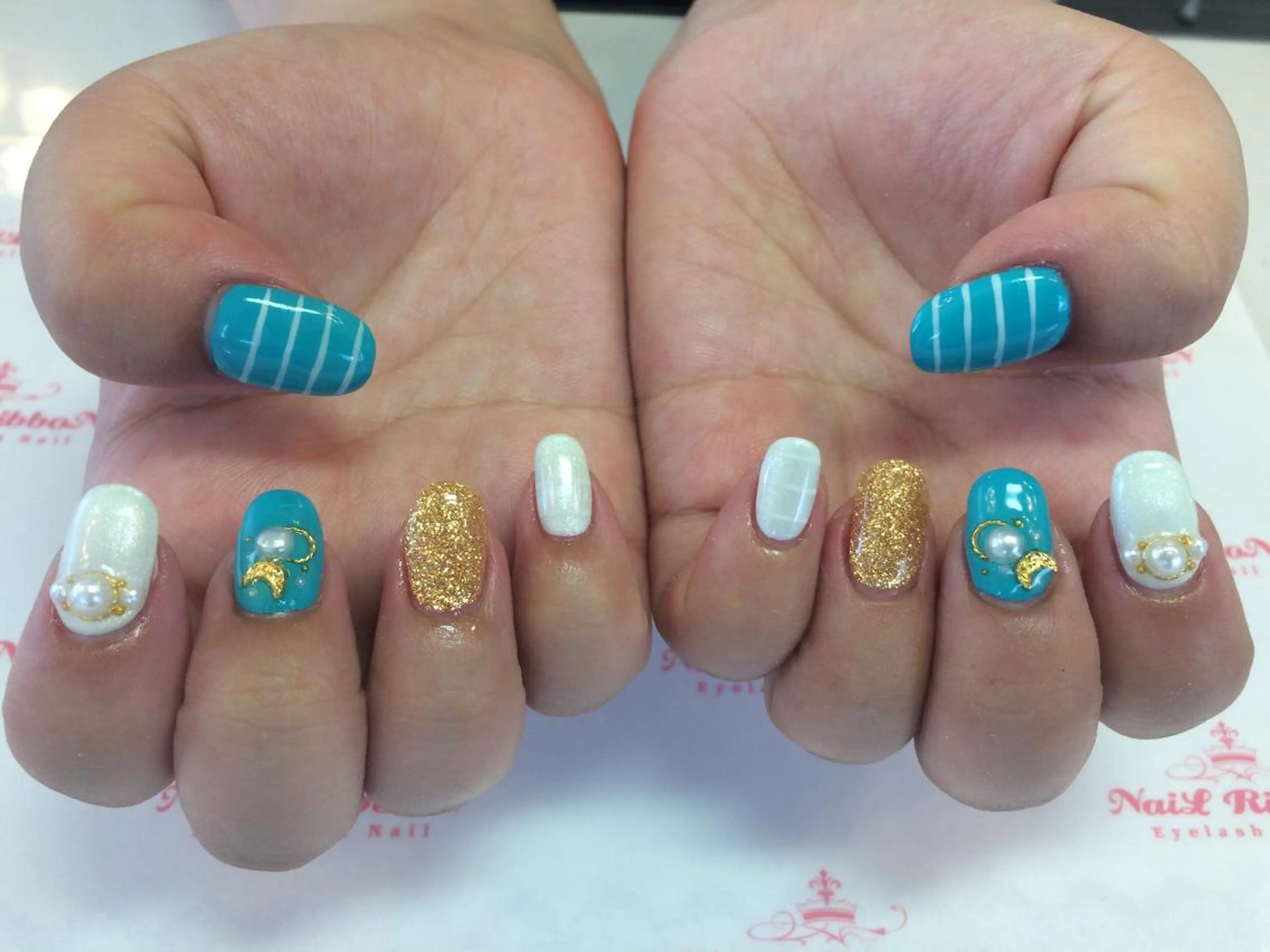 ネイル ネイルリボン 受付スタッフのネイルデザイン