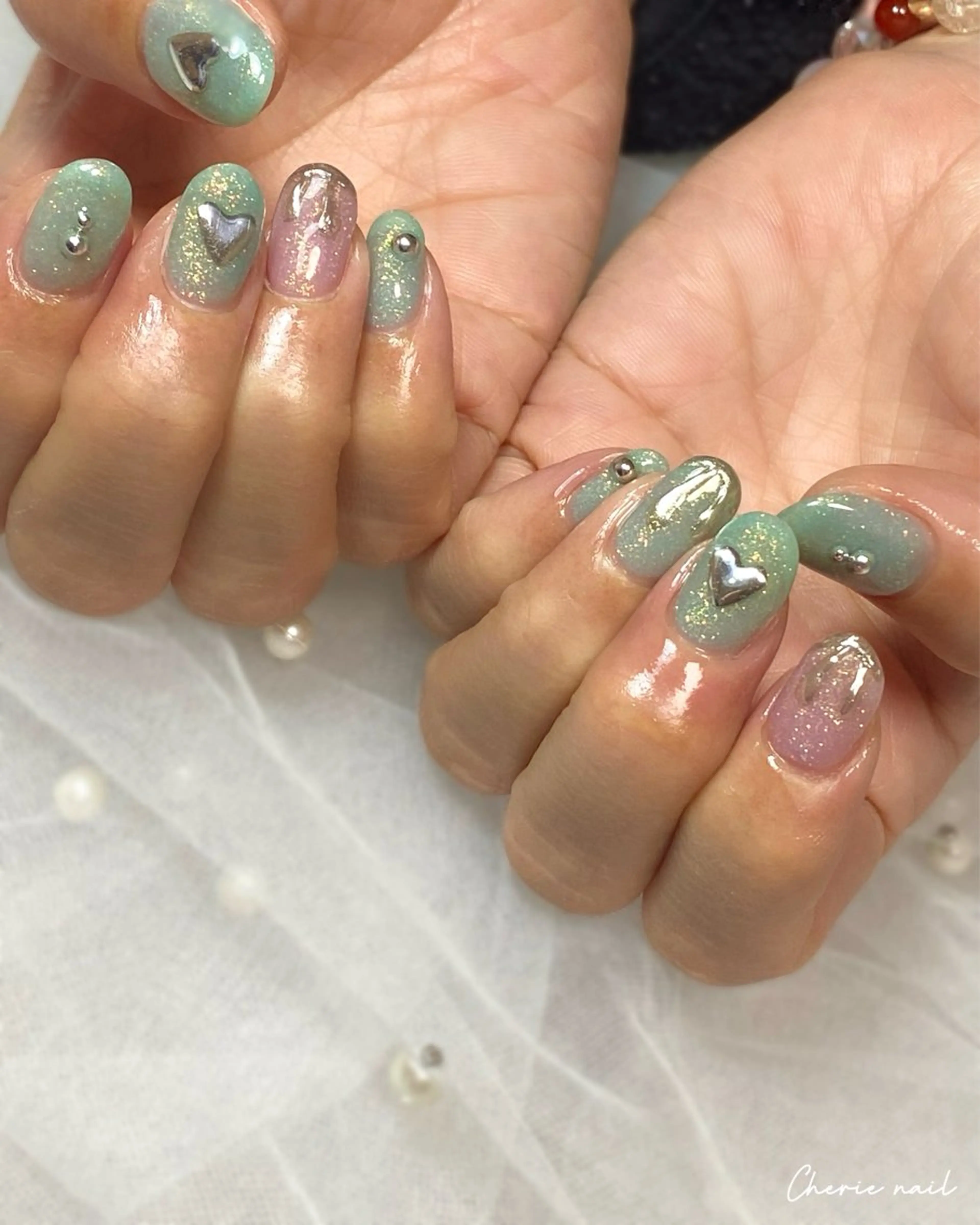 ネイル ジェルネイル ハート キラキラネイル ラメ(グリッター) 冬ネイル ハンドネイル Cherienail yunaのネイルデザイン