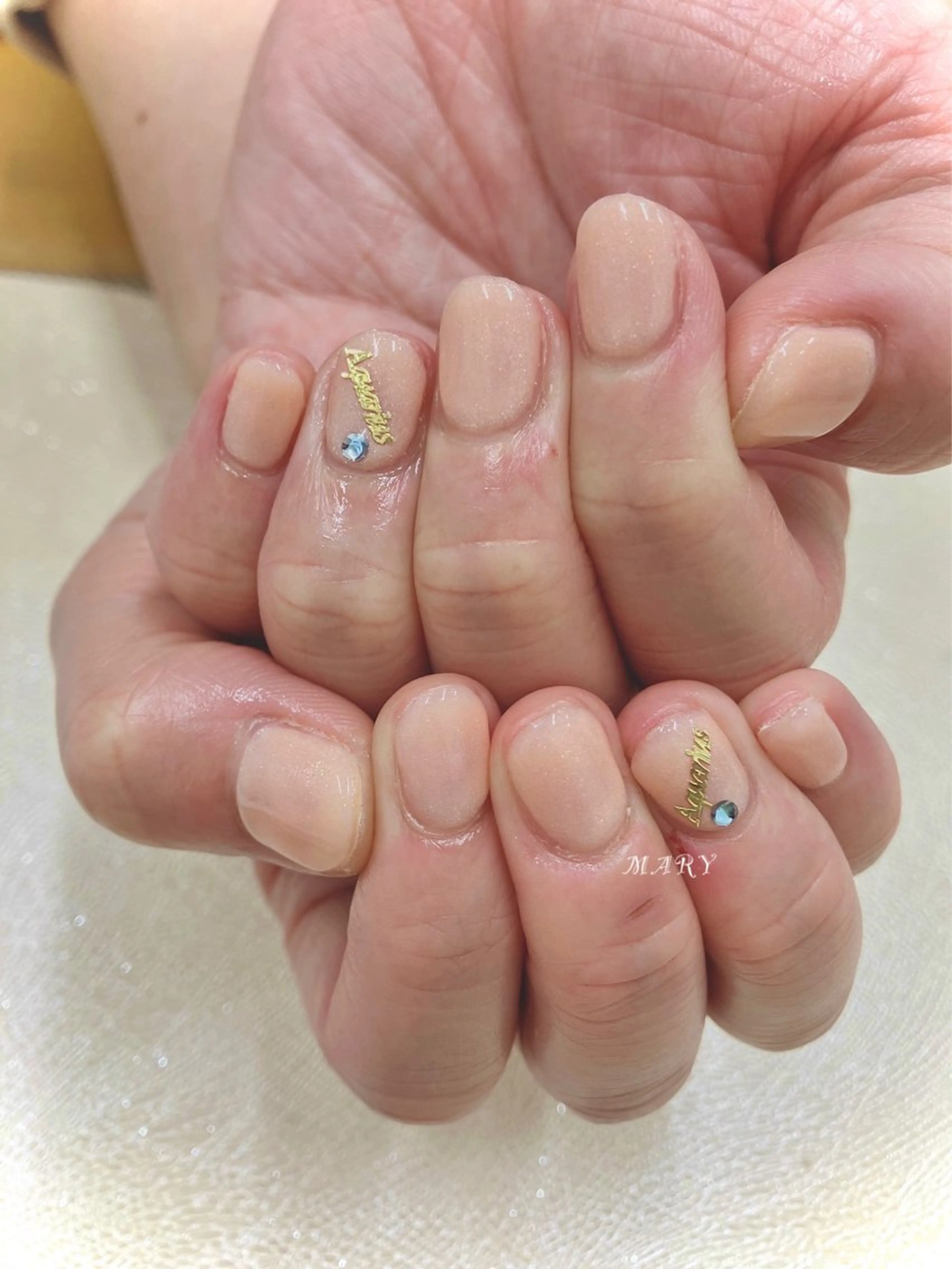 ネイル キラキラネイル ニュアンスネイル ワンカラーネイル オレンジ ハンドネイル Mary nail .narumiのネイルデザイン