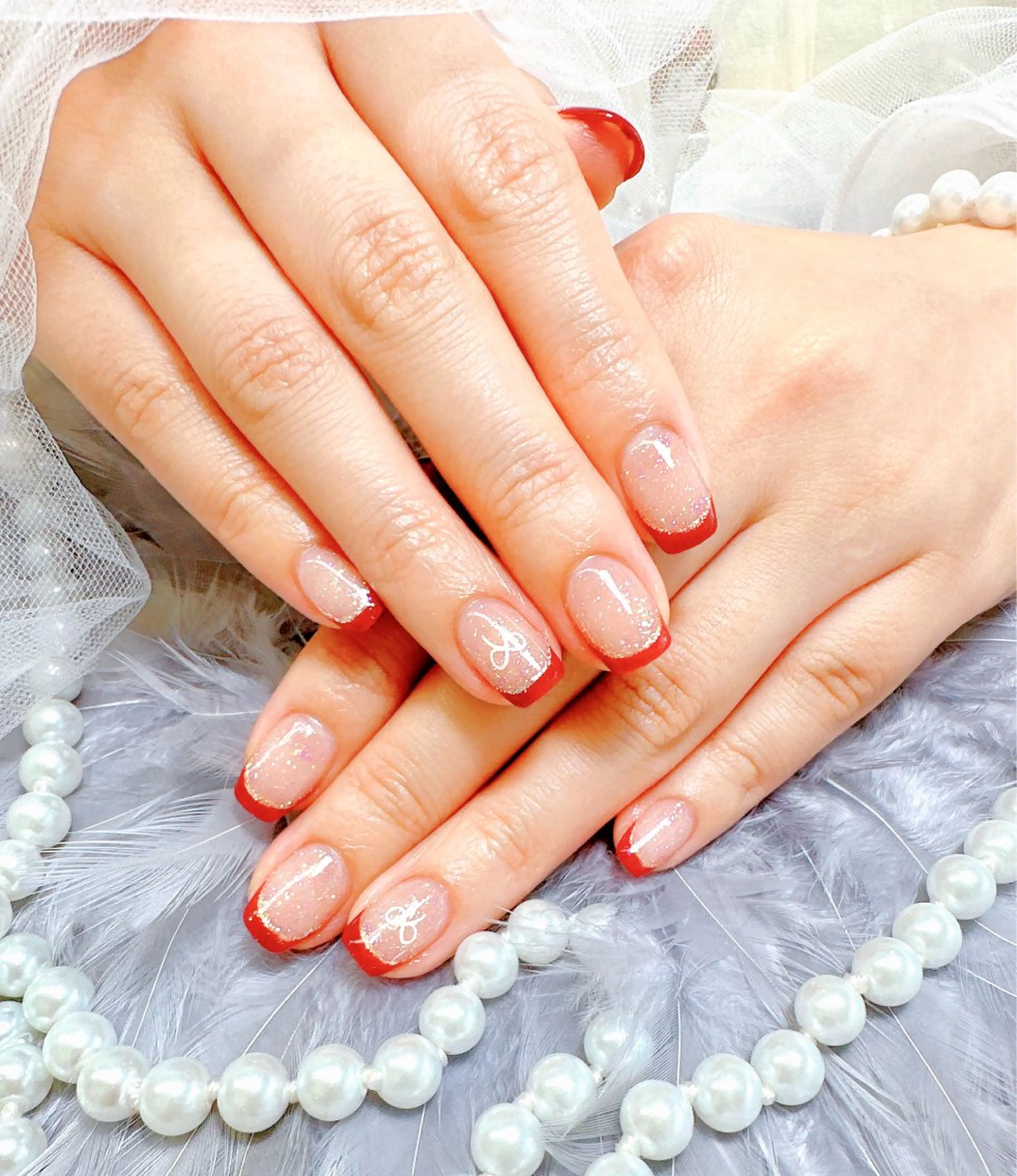 ネイル フレンチネイル キラキラネイル ラメ(グリッター) ハンドネイル Pretty Nail Salonのネイルデザイン