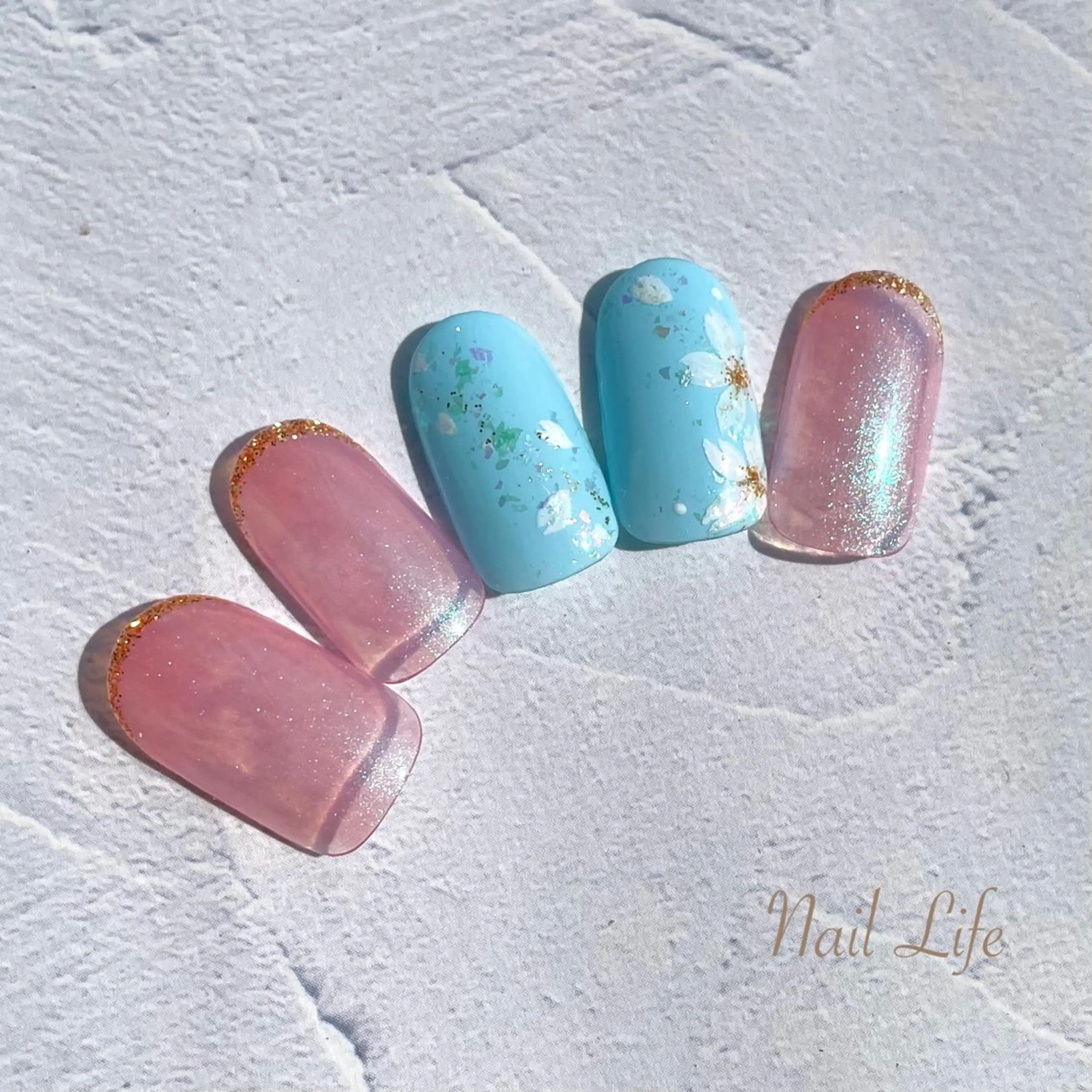 ネイル アートネイル ブルー 桜ネイル 大嶋 めぐみのネイルデザイン