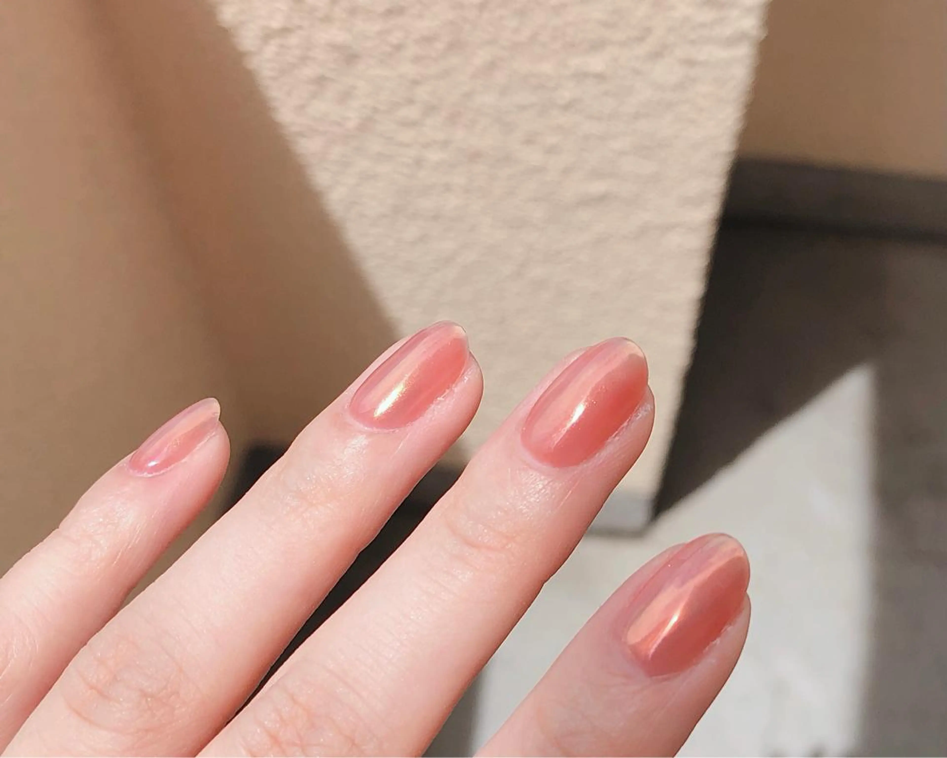 ネイル オーロラネイル ワンカラーネイル オレンジ ハンドネイル saki_ nail heronのネイルデザイン