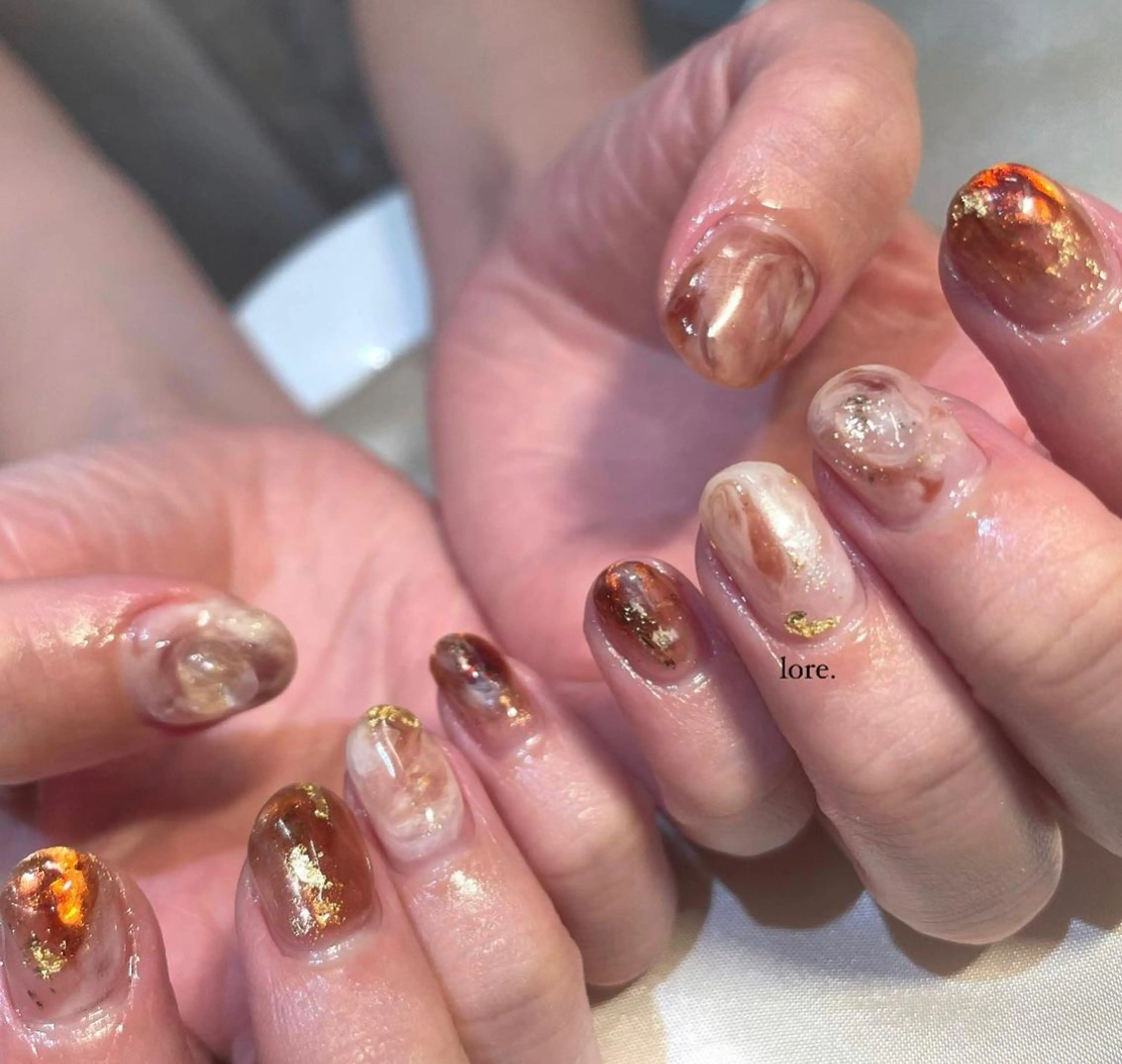 ネイル オーロラネイル ブラウン クリアネイル 成人式 フットネイル ハンドネイル lore. nailのネイルデザイン