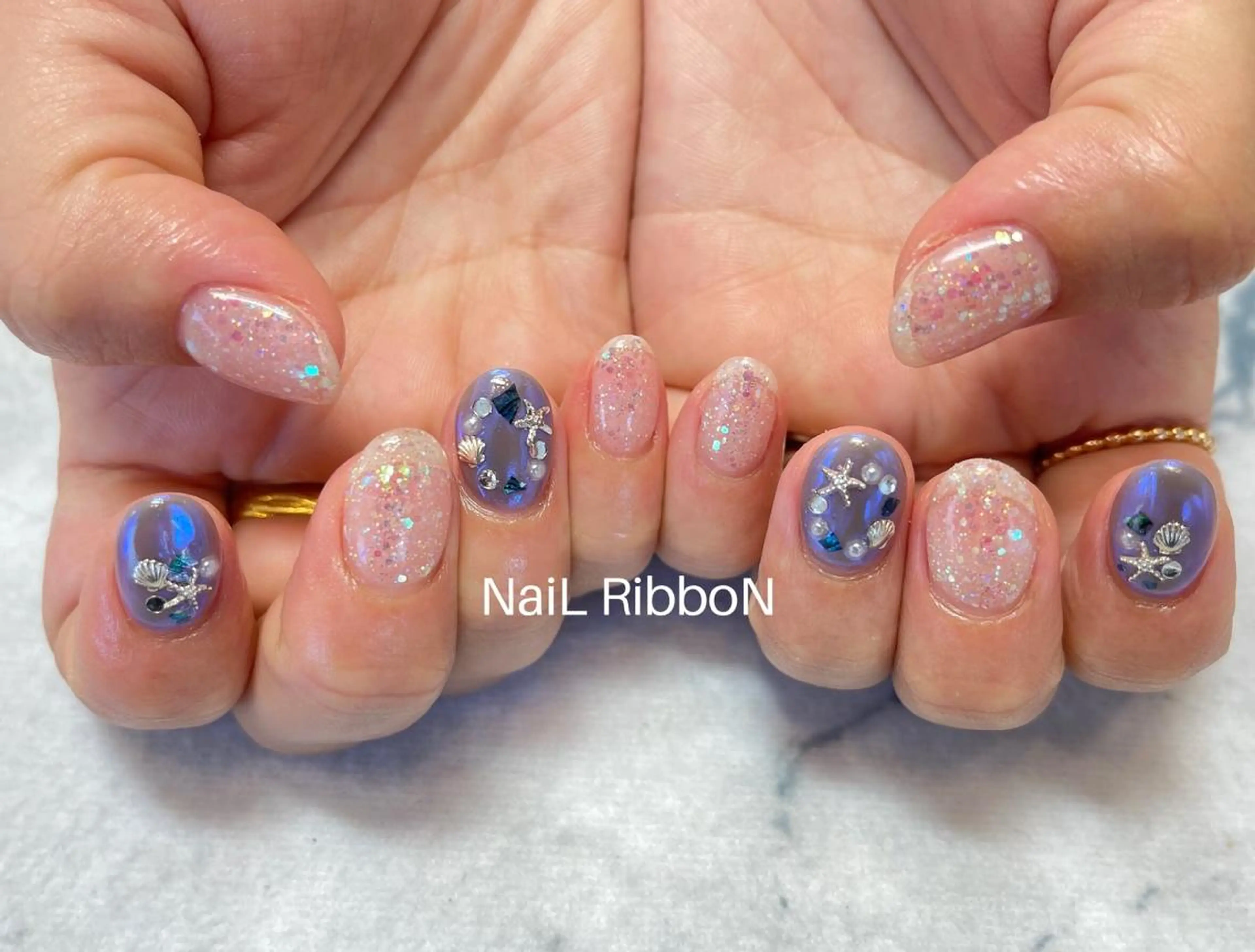 ネイル ネイルリボン 受付スタッフのネイルデザイン