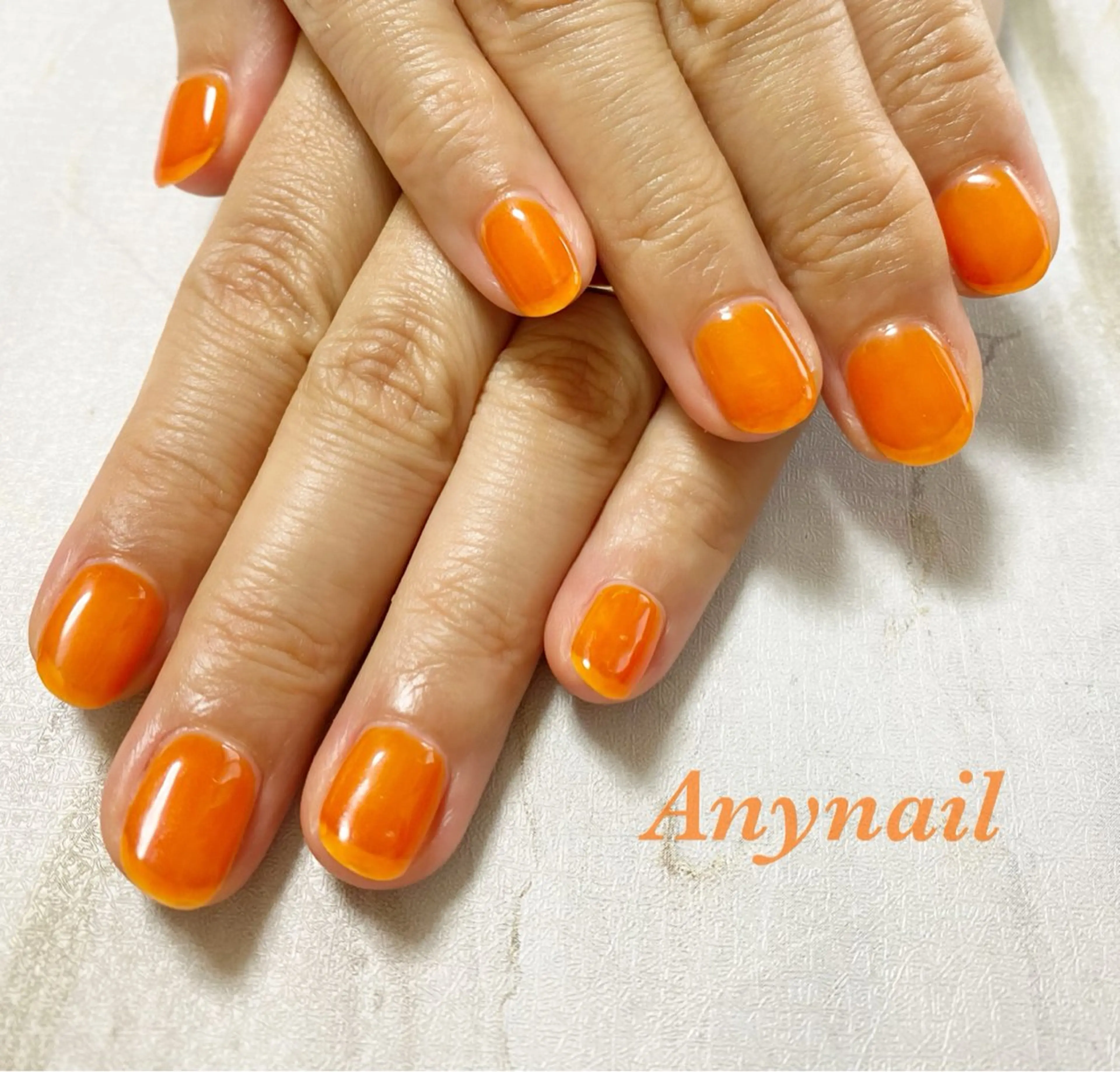 ネイル ブルー クリアネイル ワンカラーネイル オレンジ ショートネイル ハンドネイル 岩澤 恵子のネイルデザイン